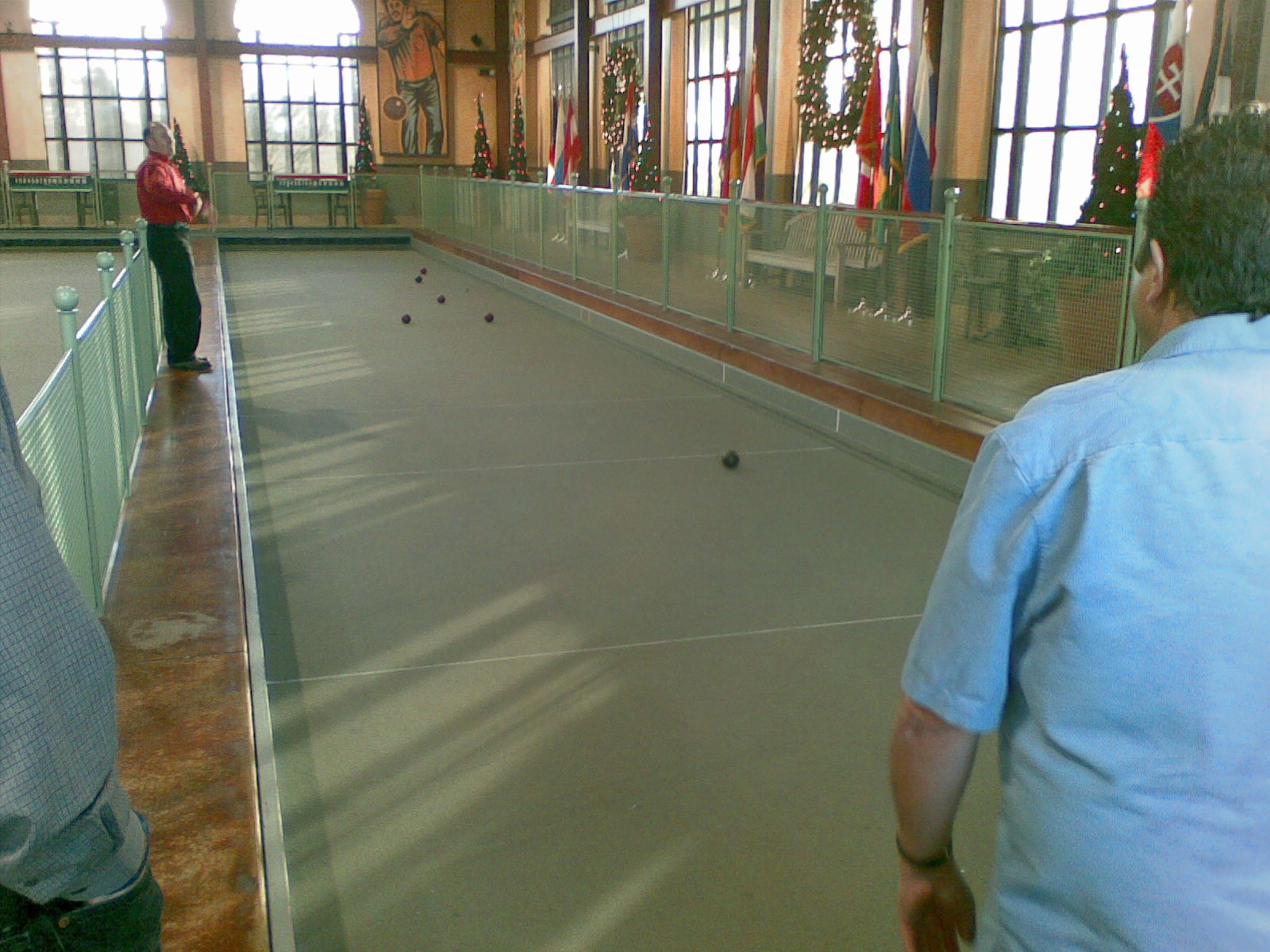 Playing bocce with some coworkers. Brad is on the left and Doug just rolled a ball.