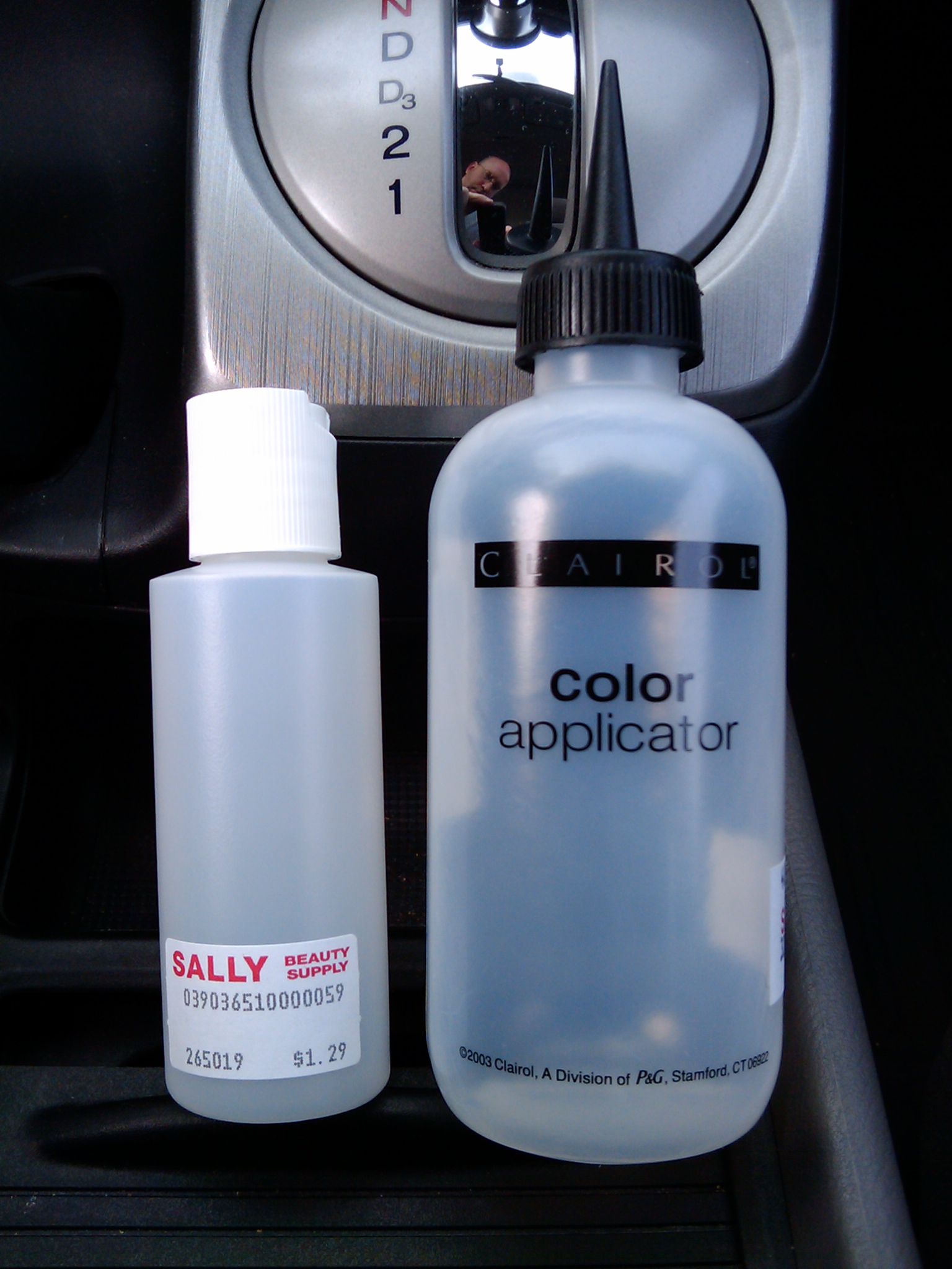 Plastic bottles purchased from Sally Beauty Supply for applying boiled linseed oil to bicycle wheel parts.