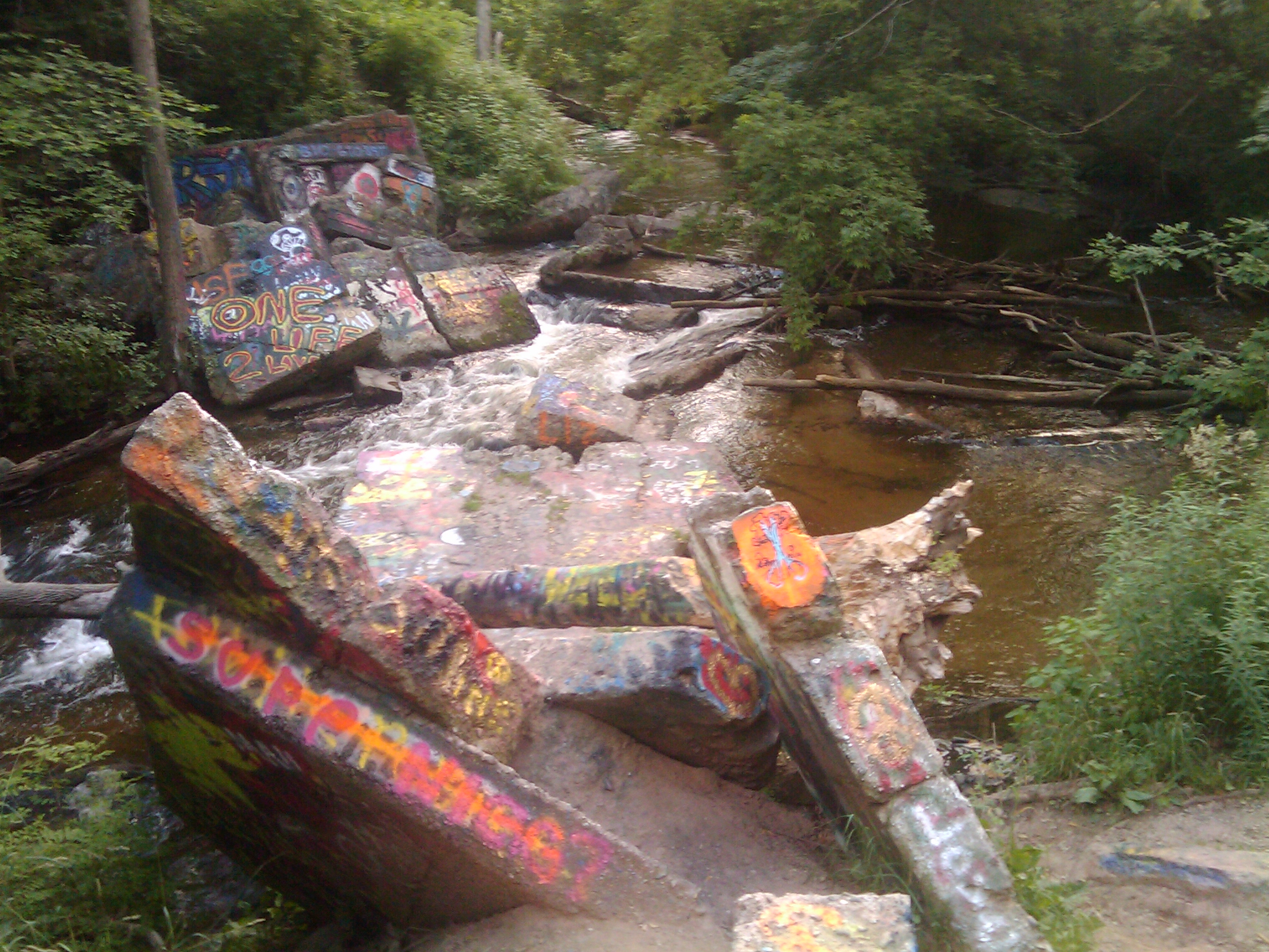 Graffiti on the rubble of the old mill at Paint Creek Trail and the Clarkston Road area.