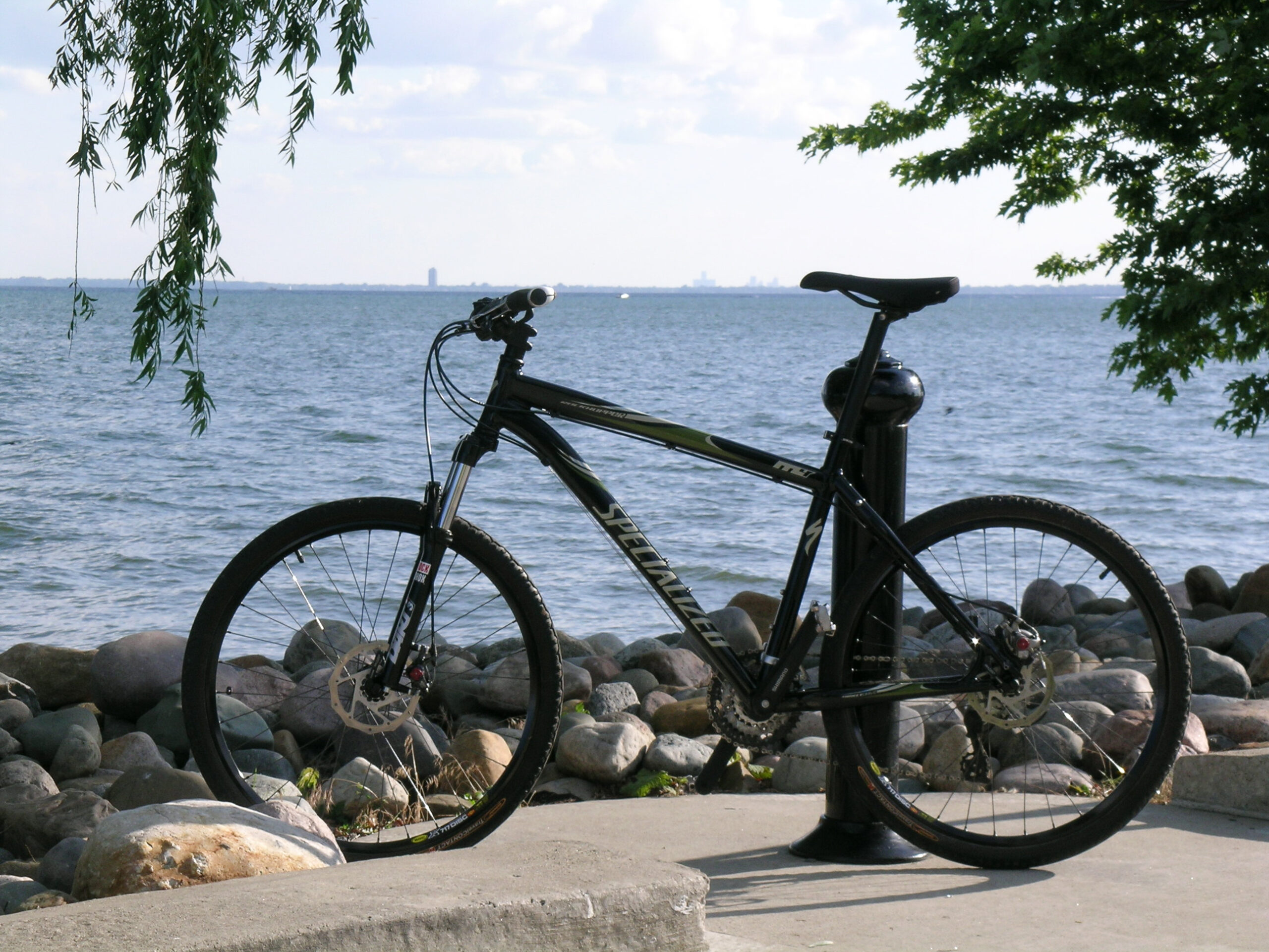 My bike at the end of the path at Metro Beach. Downtown Detroit can be seen in the distance across the water.