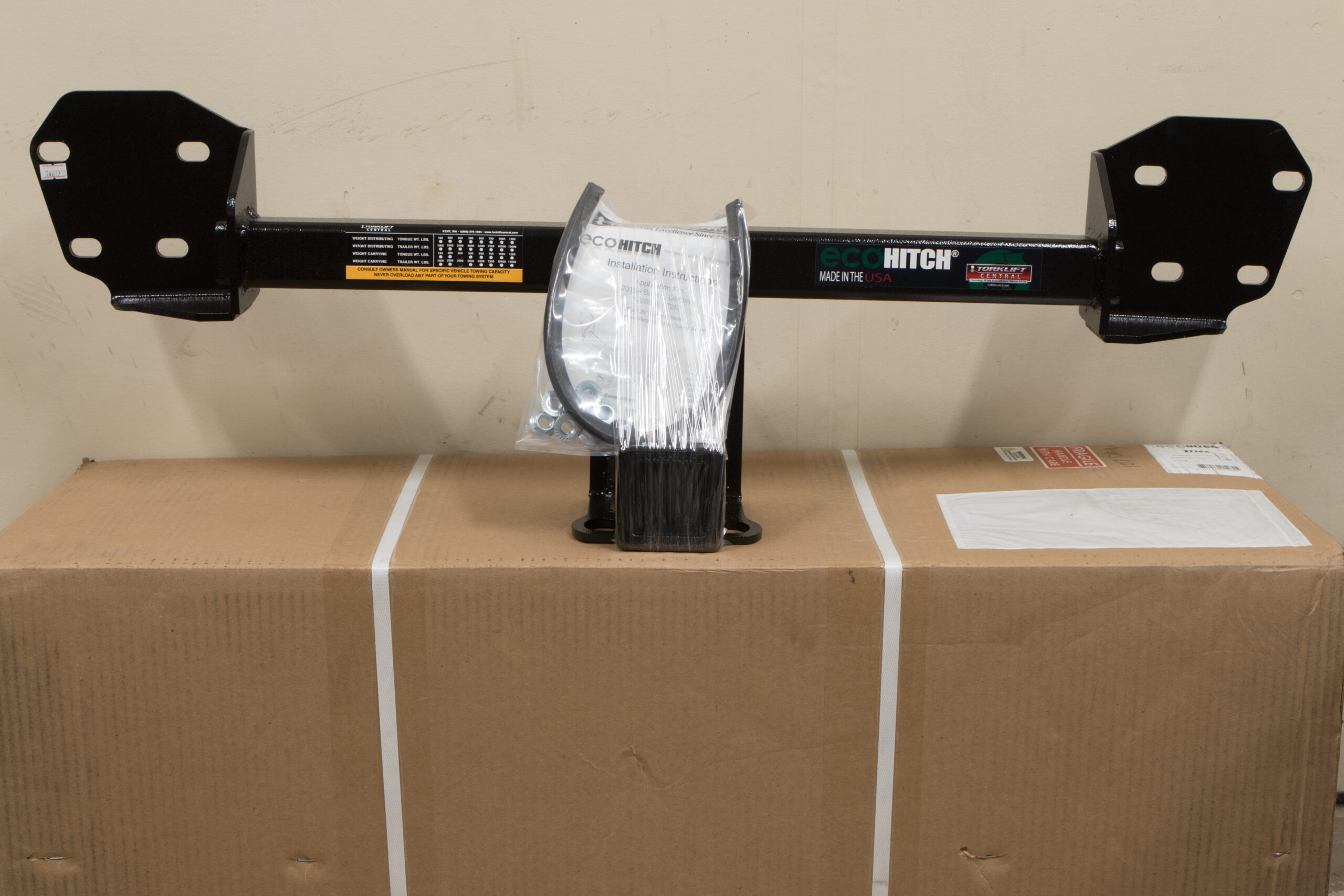 Whole rack, rear view, with installation instructions and parts bundled to the center.