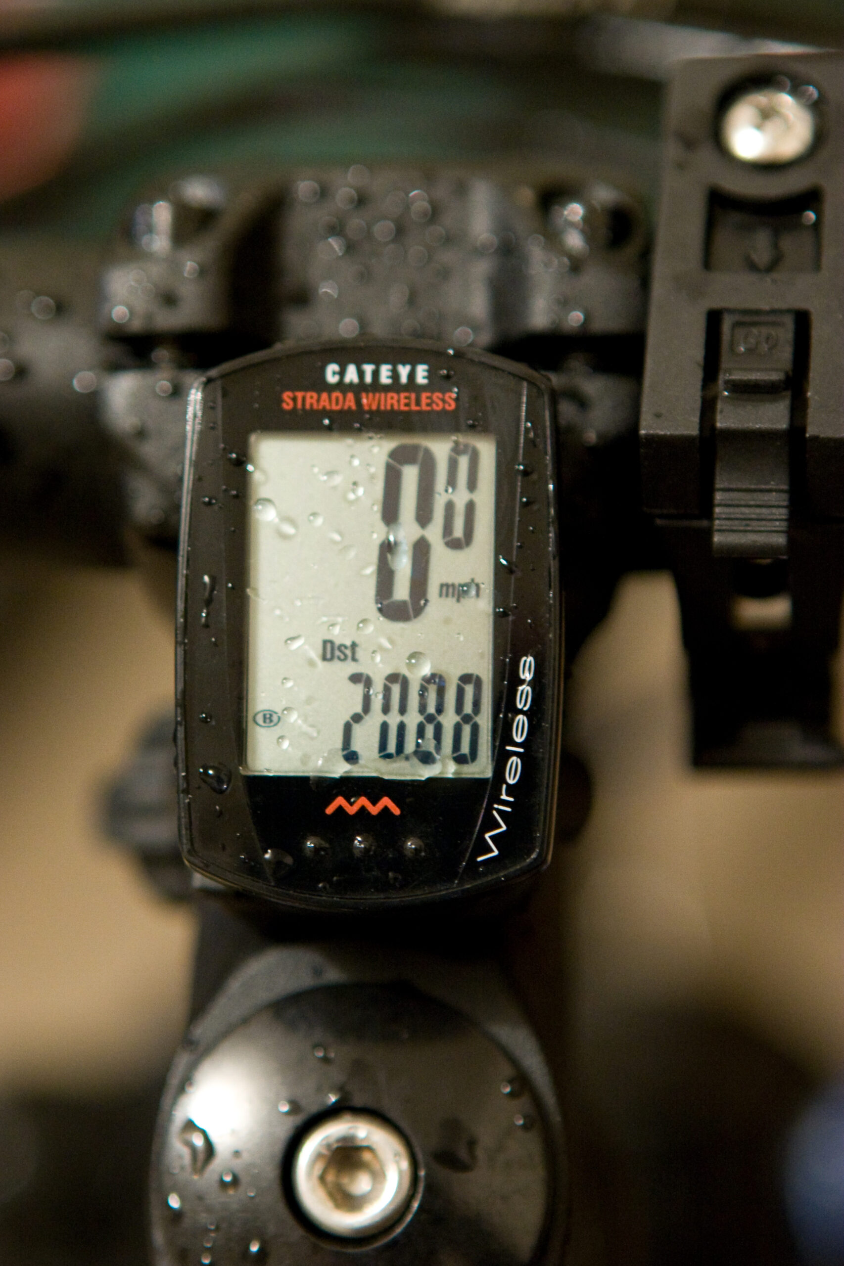 Cateye Strada Wireless computer on my bike, wet from riding in the rain.