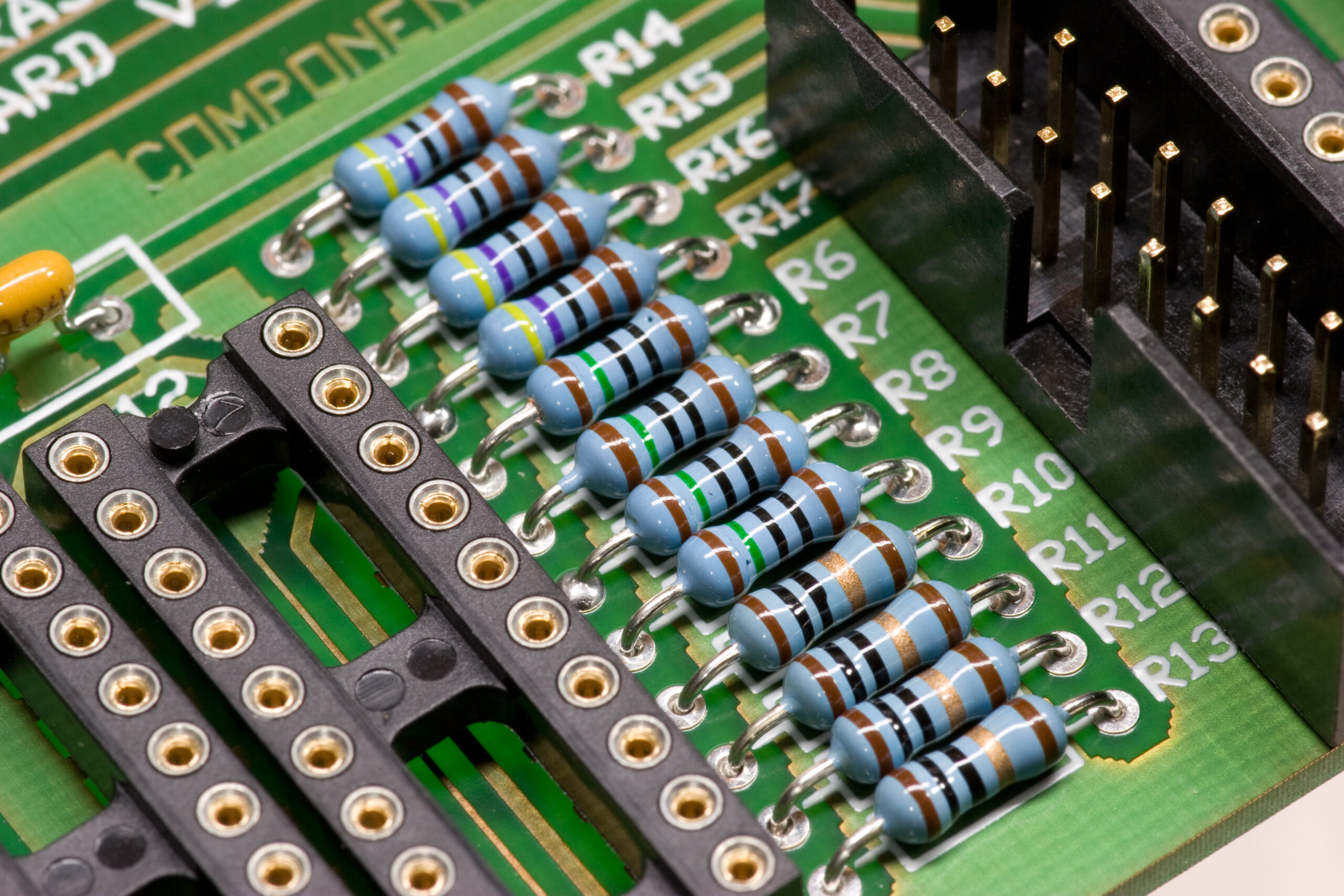 Detail of the bank of 12 resistors in the lower right corner of the mainboard PCB. I like how these look once fitted.