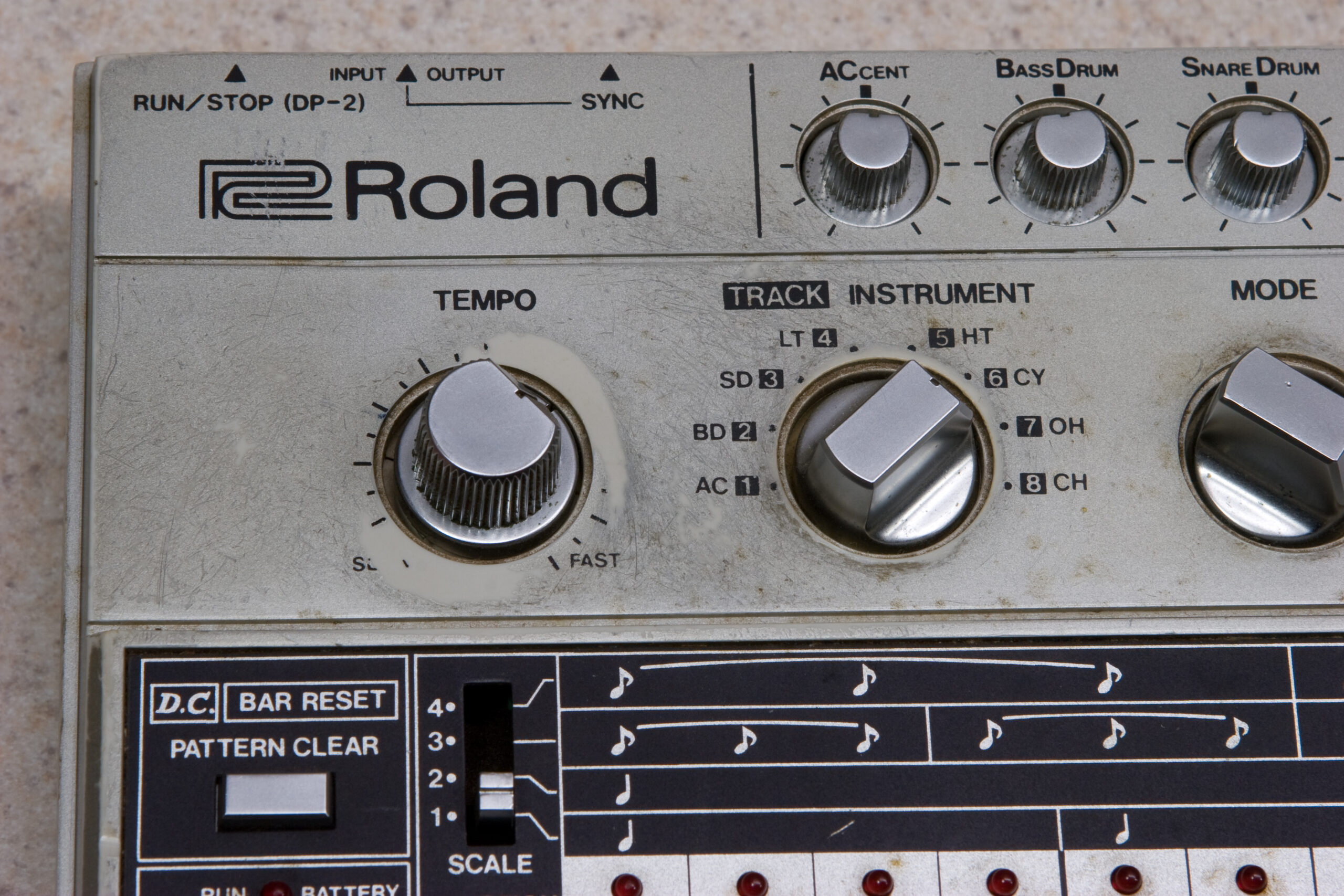 Detail of the area around the tempo knob on the TR-606 showing that it's worn down to the paint.
