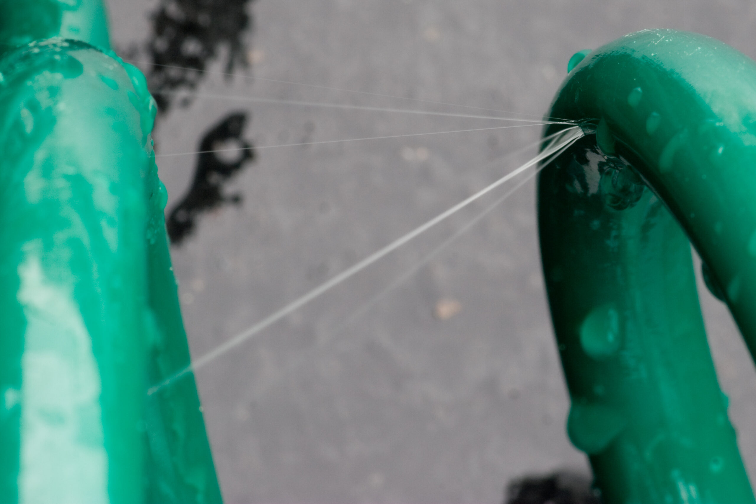 My coiled green plastic hose has developed a leak. I'm not quite sure how this happened.