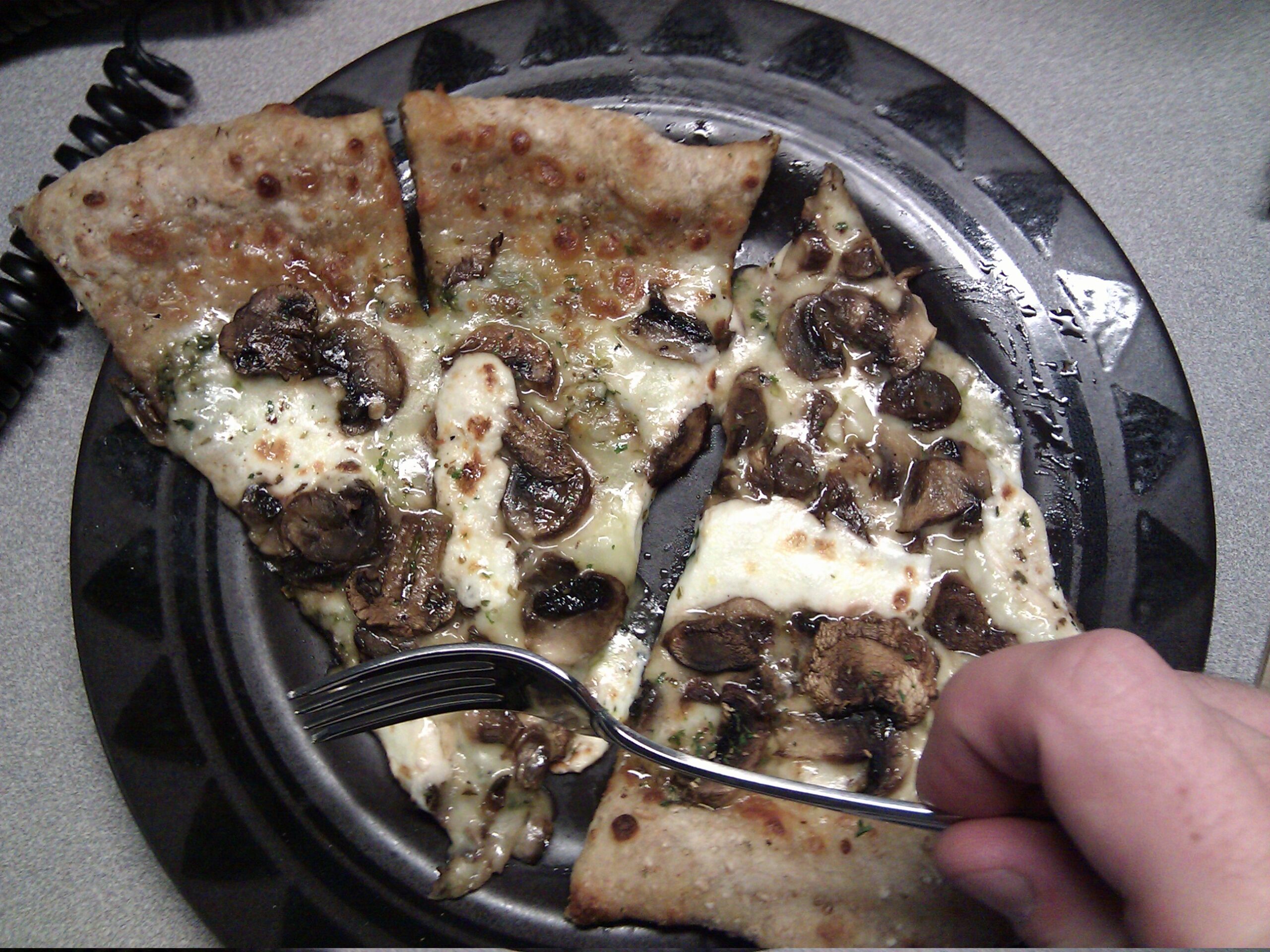 Sometimes I put the pizza on the plate backwards, making it harder for my right-handed self to eat.