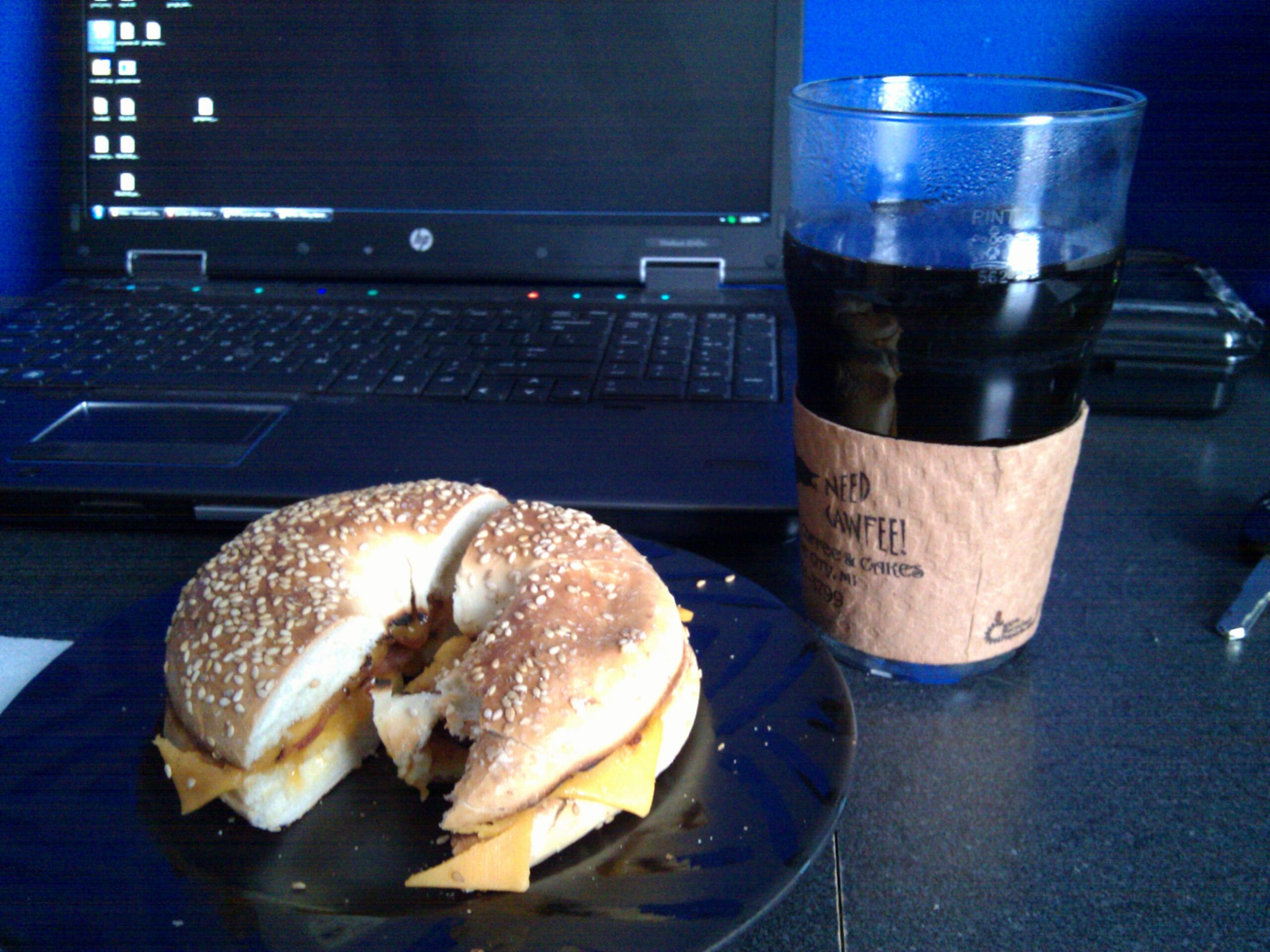 Sesame bagel with cheddar and bacon, along with a nice pint of coffee. A great late breakfast / lunch while working from home.