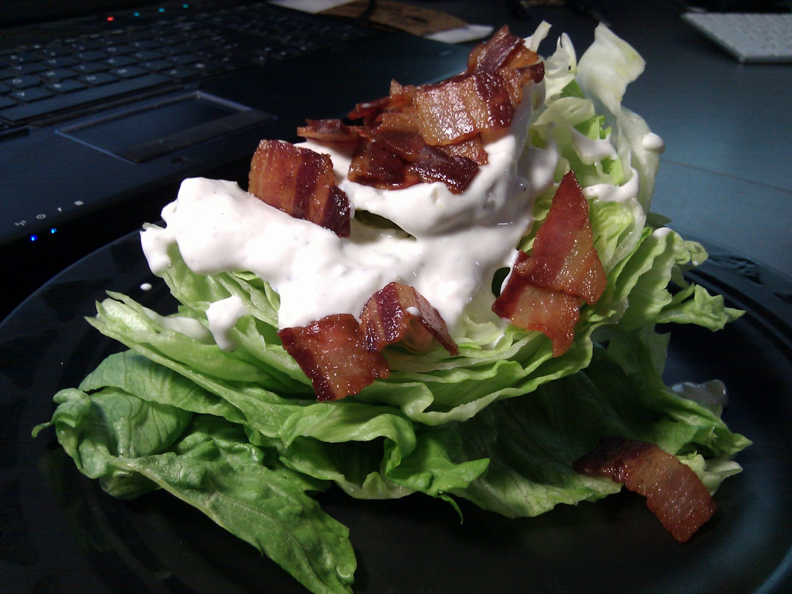 Blue cheese and bacon salad made by Danielle with fresh dressing and extremely high quality bacon.