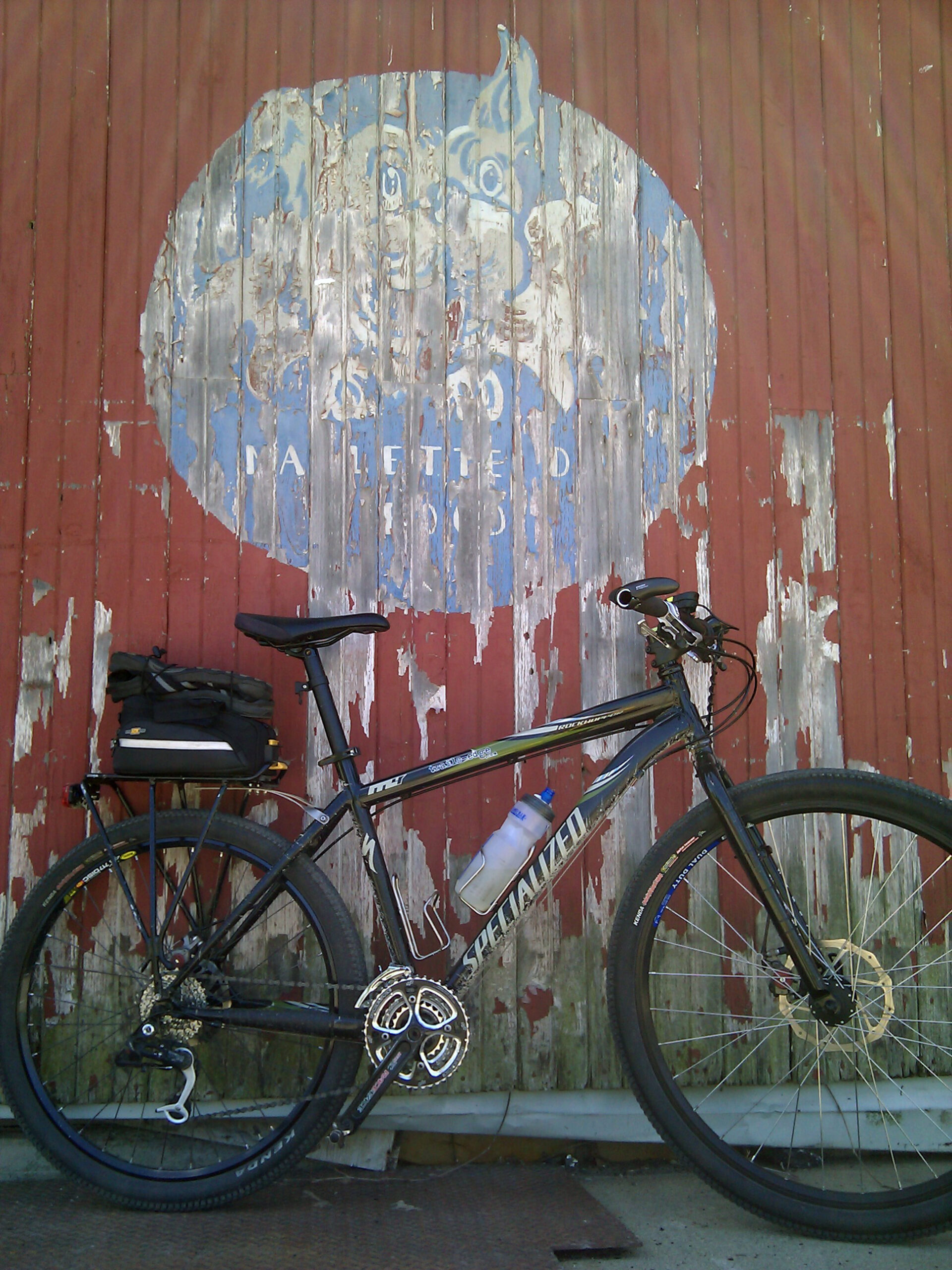 Old train loading dock along the Macomb Orchard Trail in Armada, MI. En route to my parents house on Mother's Day. (Contrast adjusted from moblog version.)
