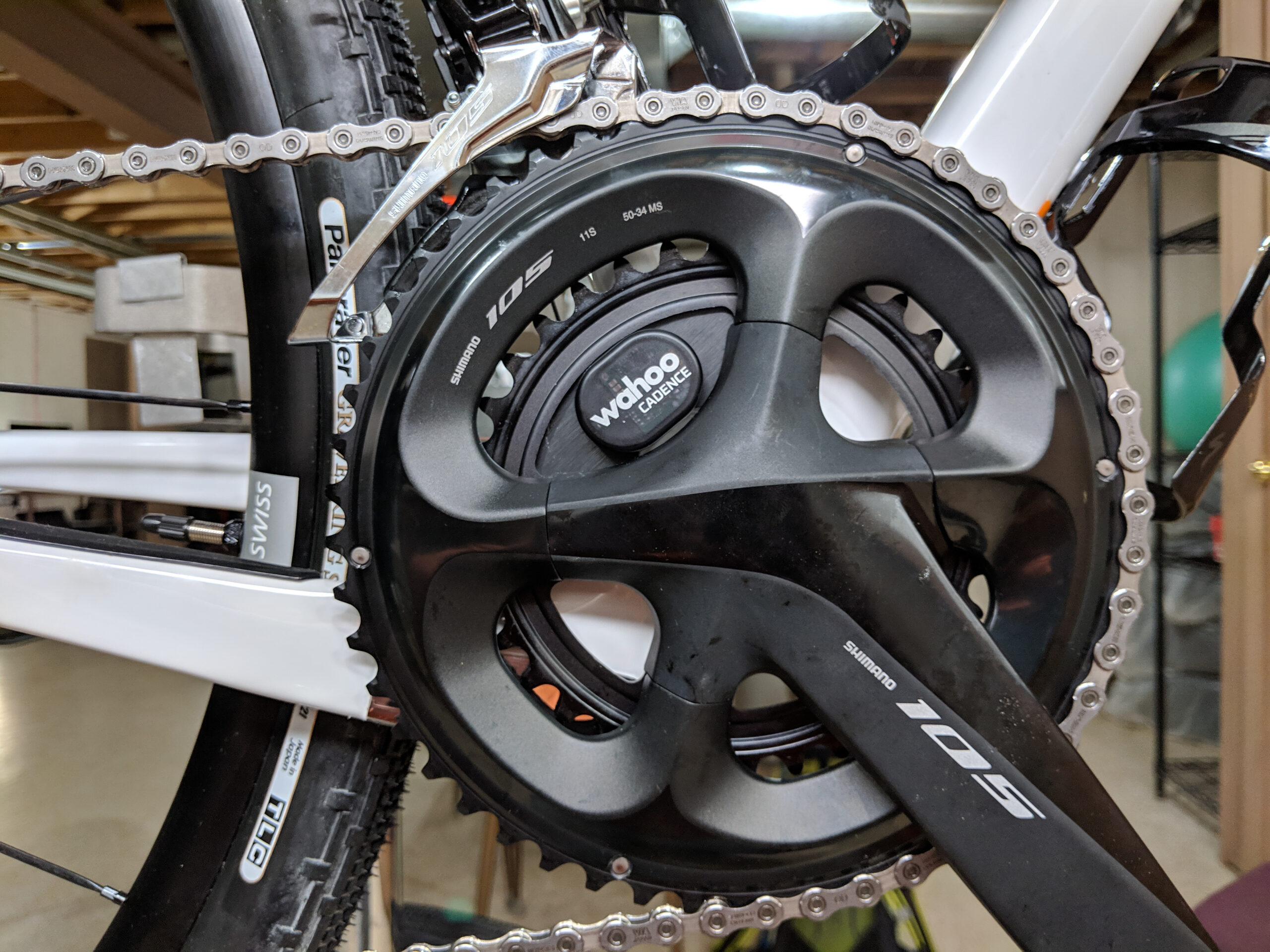Wahoo RPM cadence sensor mounted on a plate opposite the crank arm.