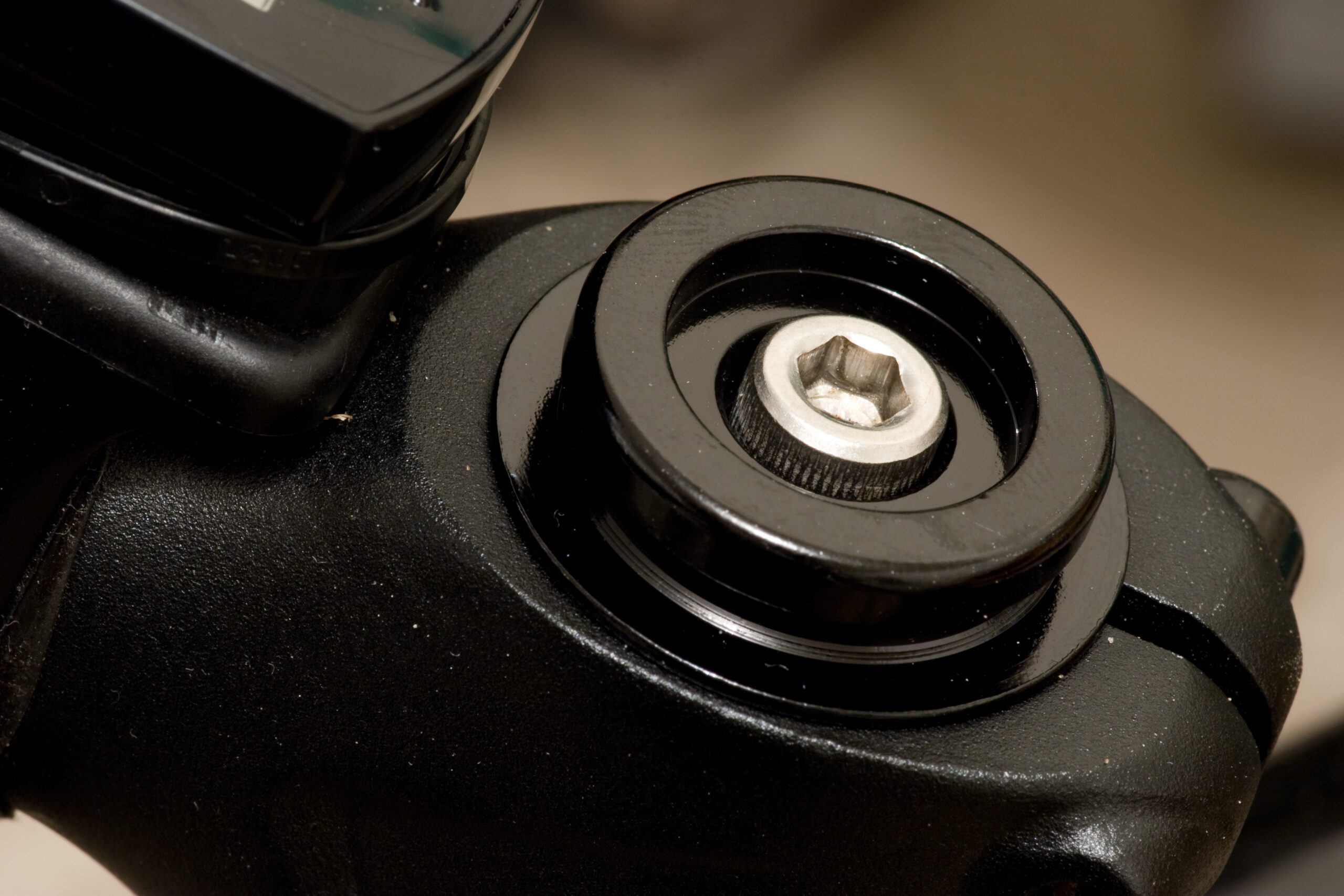 The Niner YAWYD top cap on my bike, ready to have a bottle cap snapped in place.
