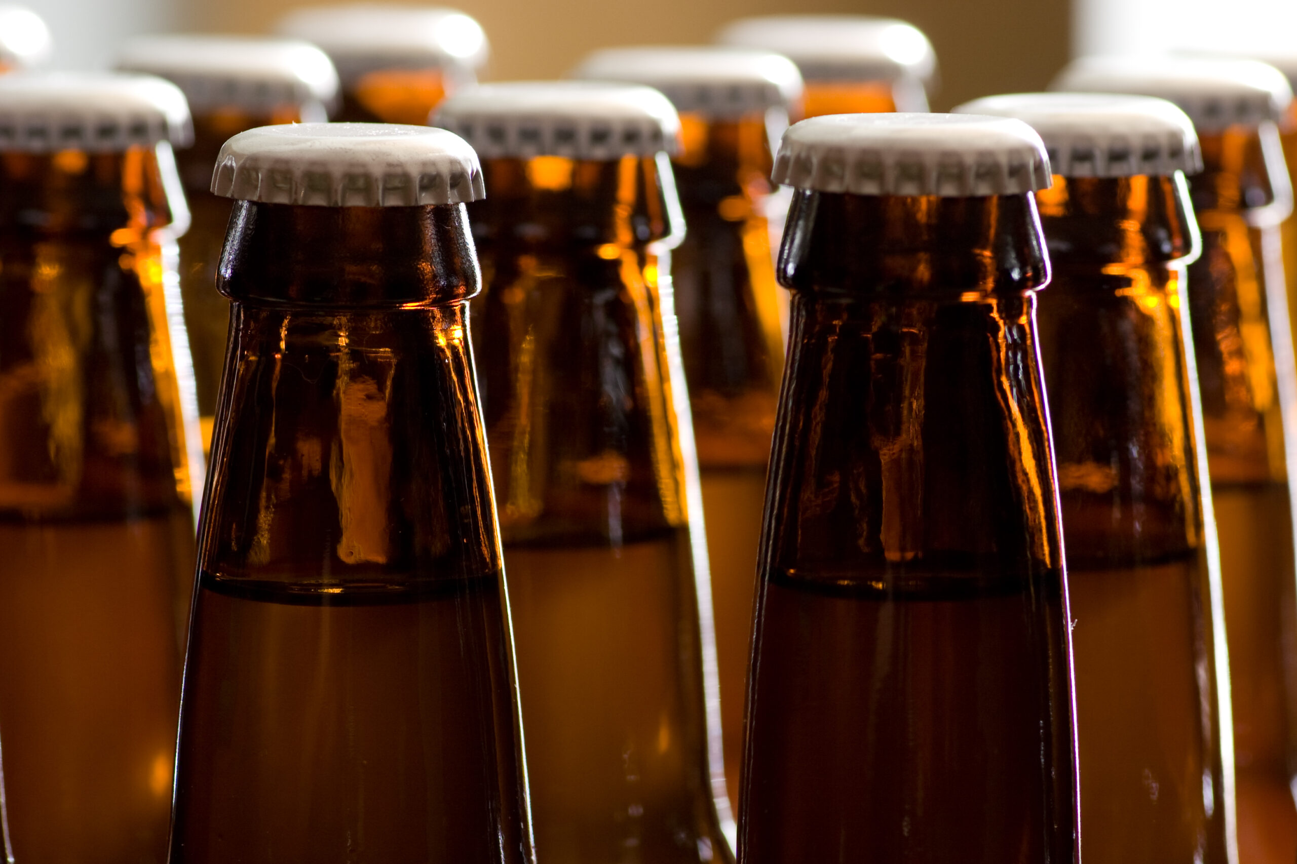 Tops of some of the bottles making up just over two cases of 10% hard cider.