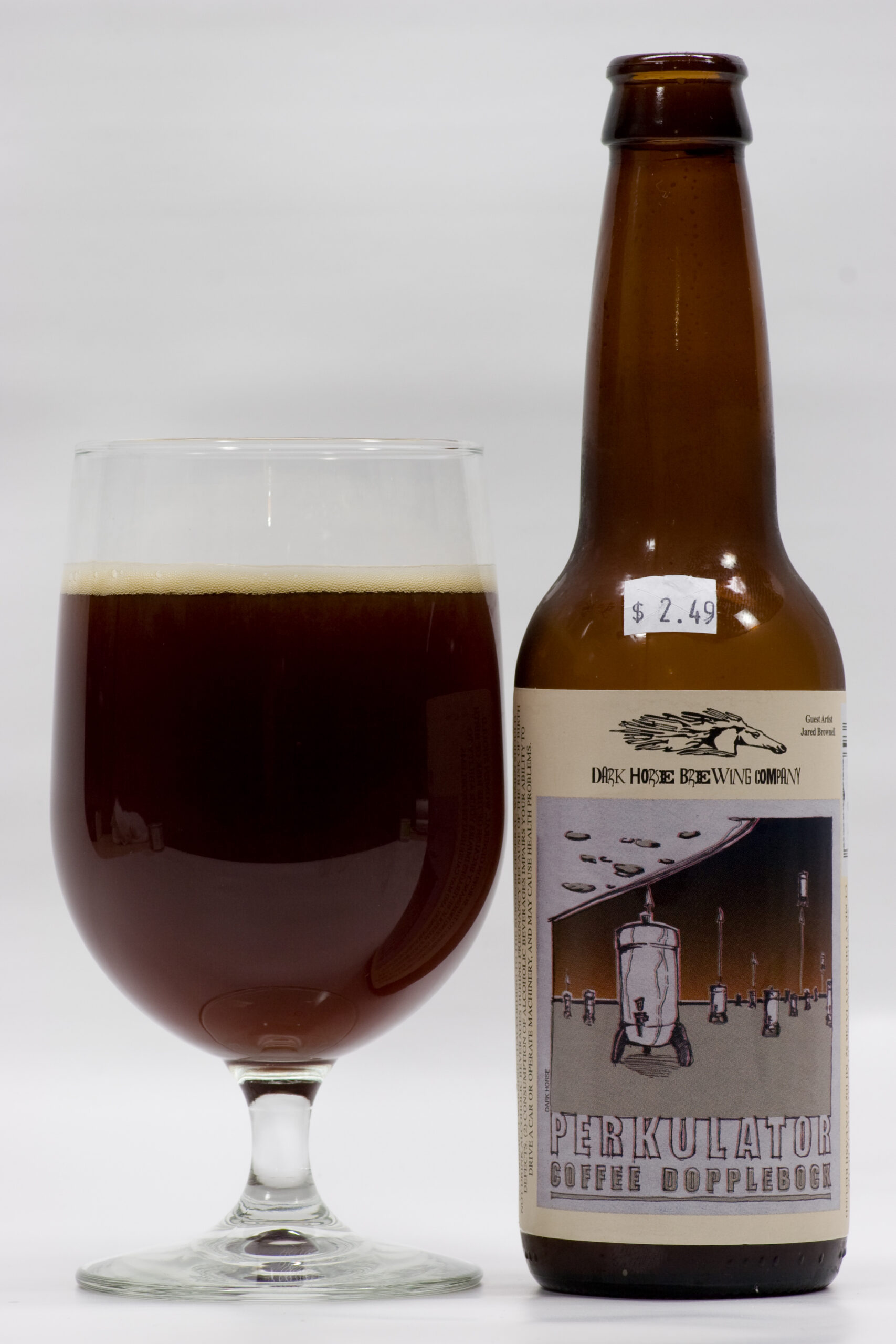 Dark Horse Brewing's Perkulator Coffee Dopplebock poured into a glass. It tastes strongly of coffee, with a nice malt taste.