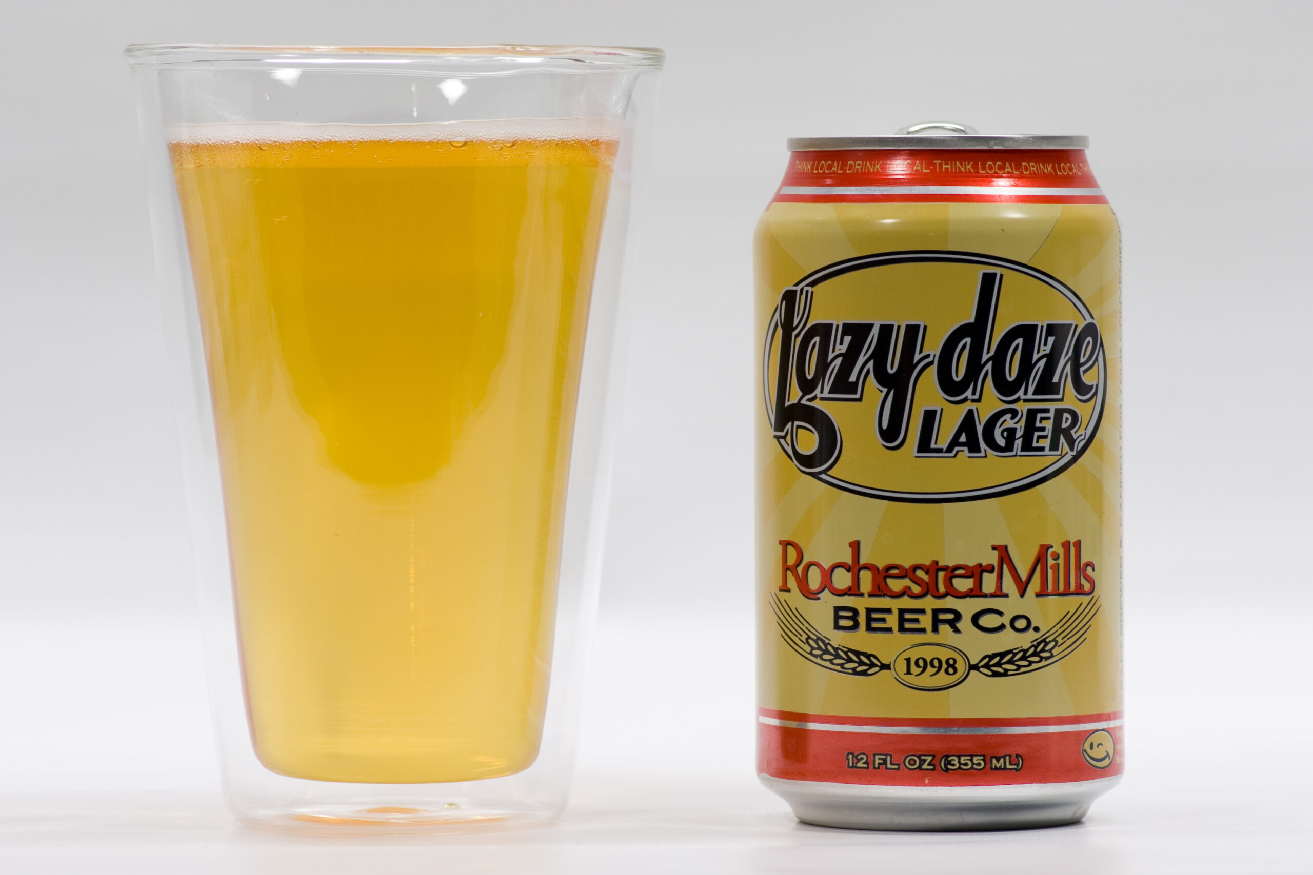 Rochester Mills Lazy Daze Lager, poured from a can into a Bodum insulated glass.