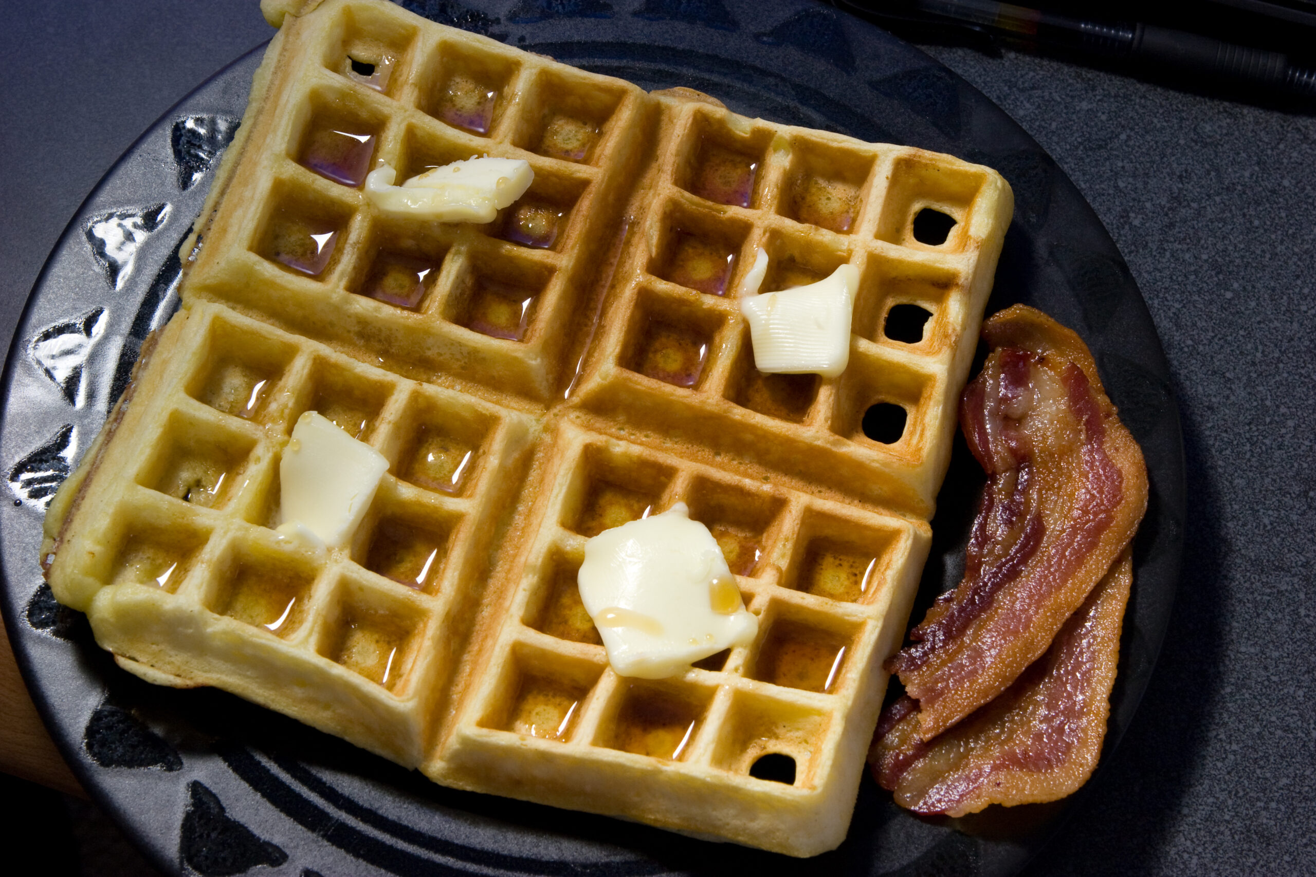 Fresh waffles made by Danielle, and peanut-fed Berkshire bacon purchased at Zingerman's Deli.