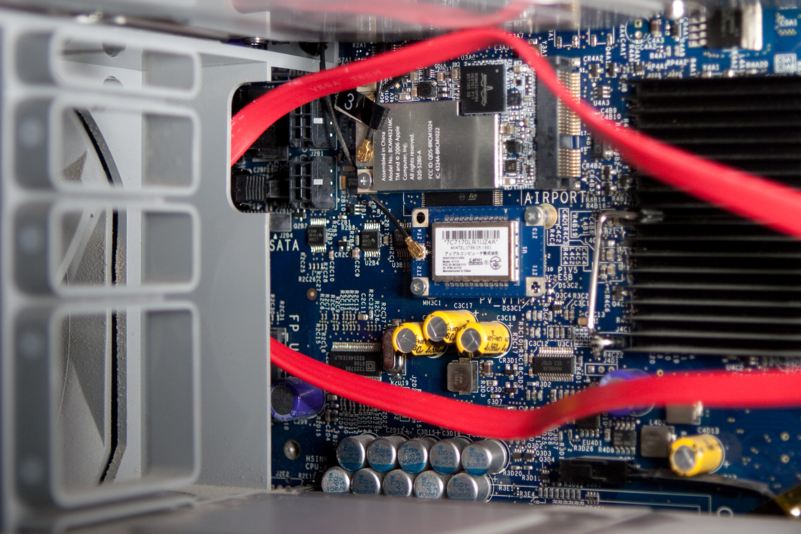 Two SATA cables connected to the ODD SATA port in my Mac Pro, leading to external connectors fitted in a slot on the back of the case.