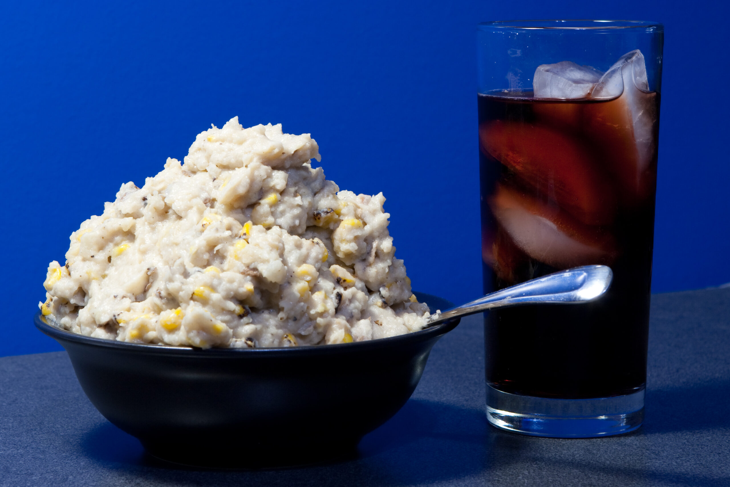 Baked potato and roasted garlic mashed potatoes with fire roasted corn. With a glass of Sangria Señorial soda.
