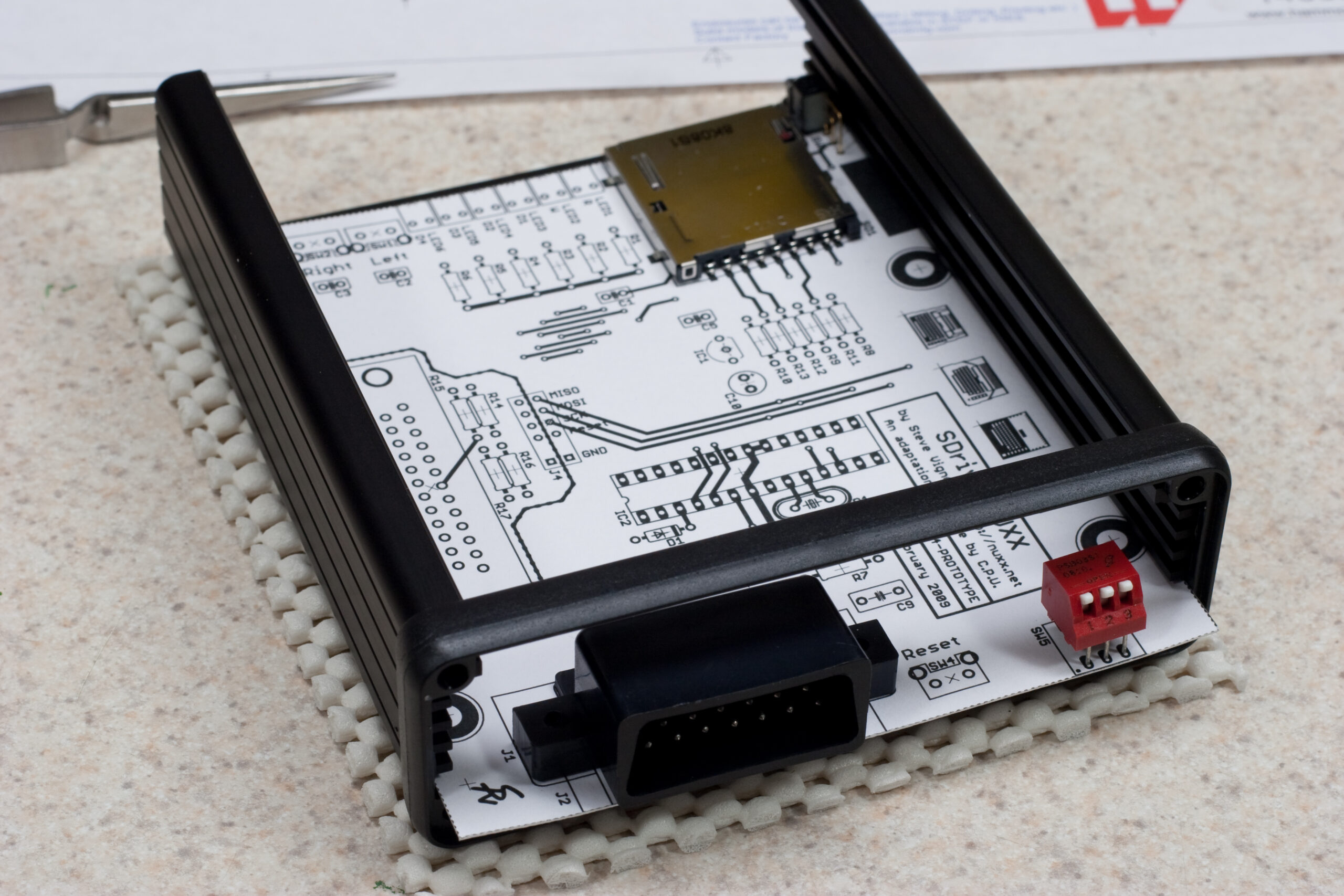 Because the PCB can slide past the bezel I will be able to make the PCB 3mm longer so that it will sit directly against the front and rear panels.