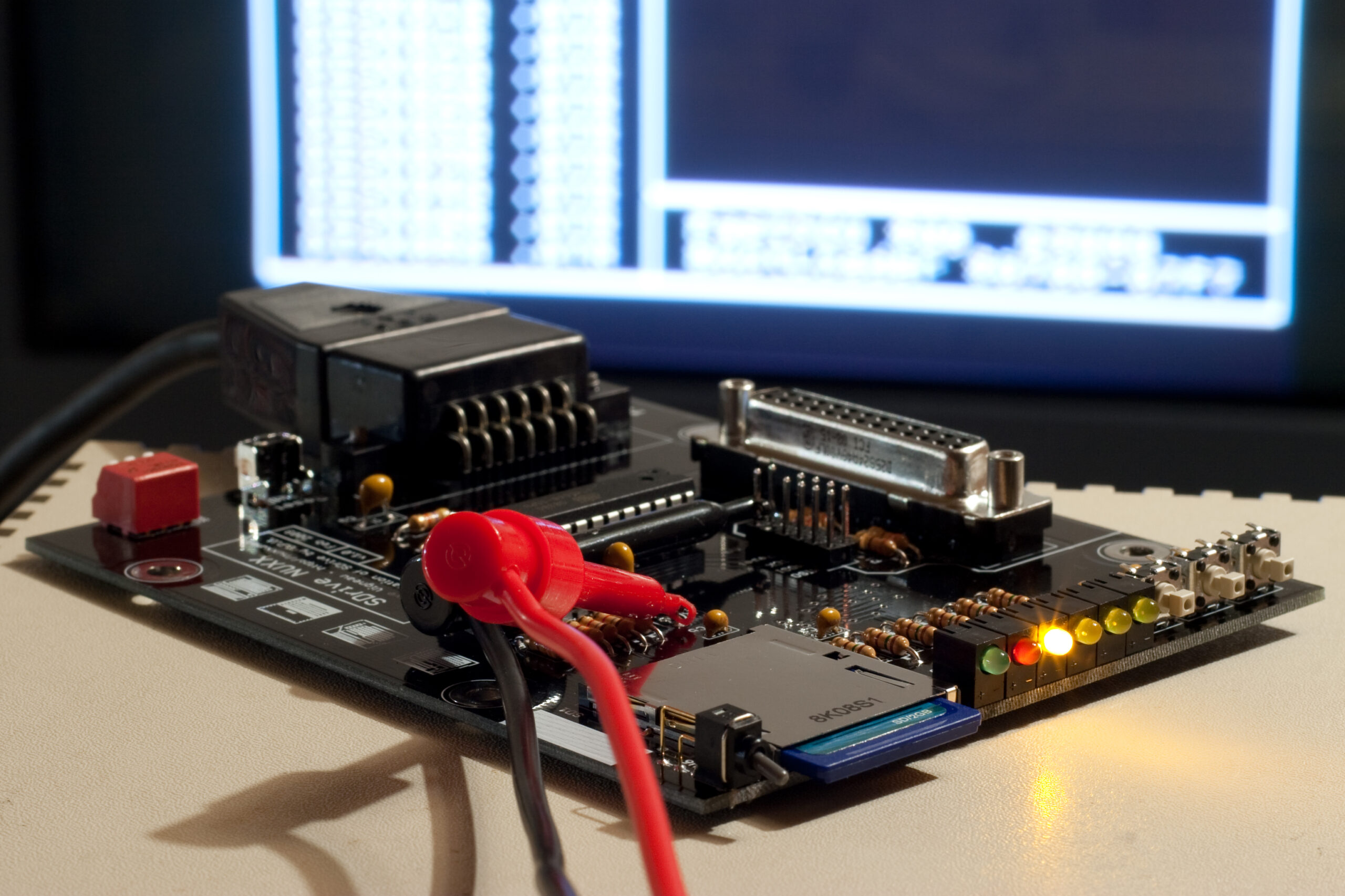 The SDrive NUXX up and running, with the SDrive by C.P.U. software running on the television behind via my Atari 800XL.