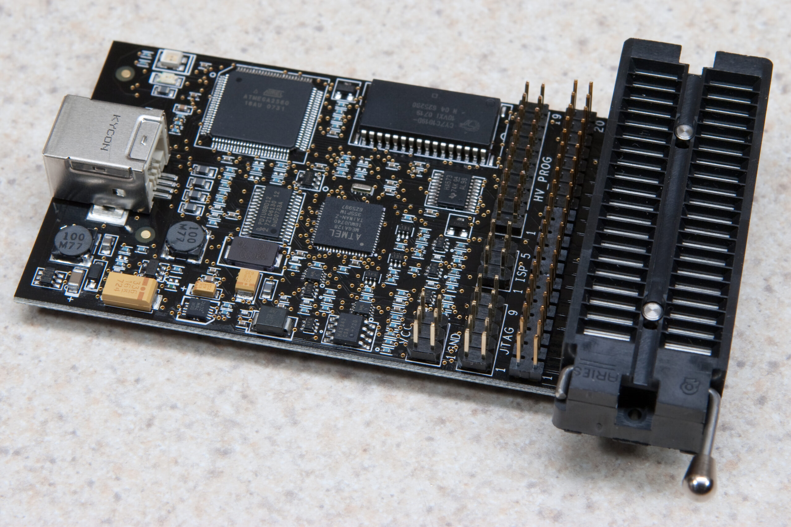 Overview of the Atmel AVR Dragon with extra pin headers, LRF, and DIP40 ZIF socket in place.