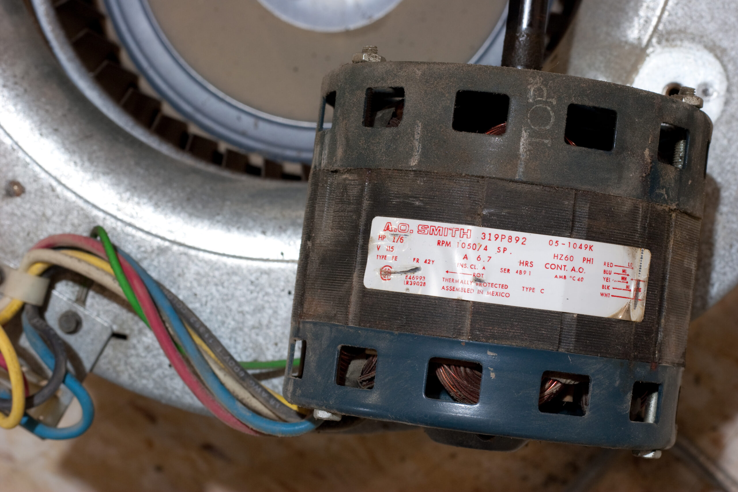 Closeup of the blower motor from inside my furnace, an A.O. Smith 319P892. This is from a Carrier 394GAZ024075AAEA.