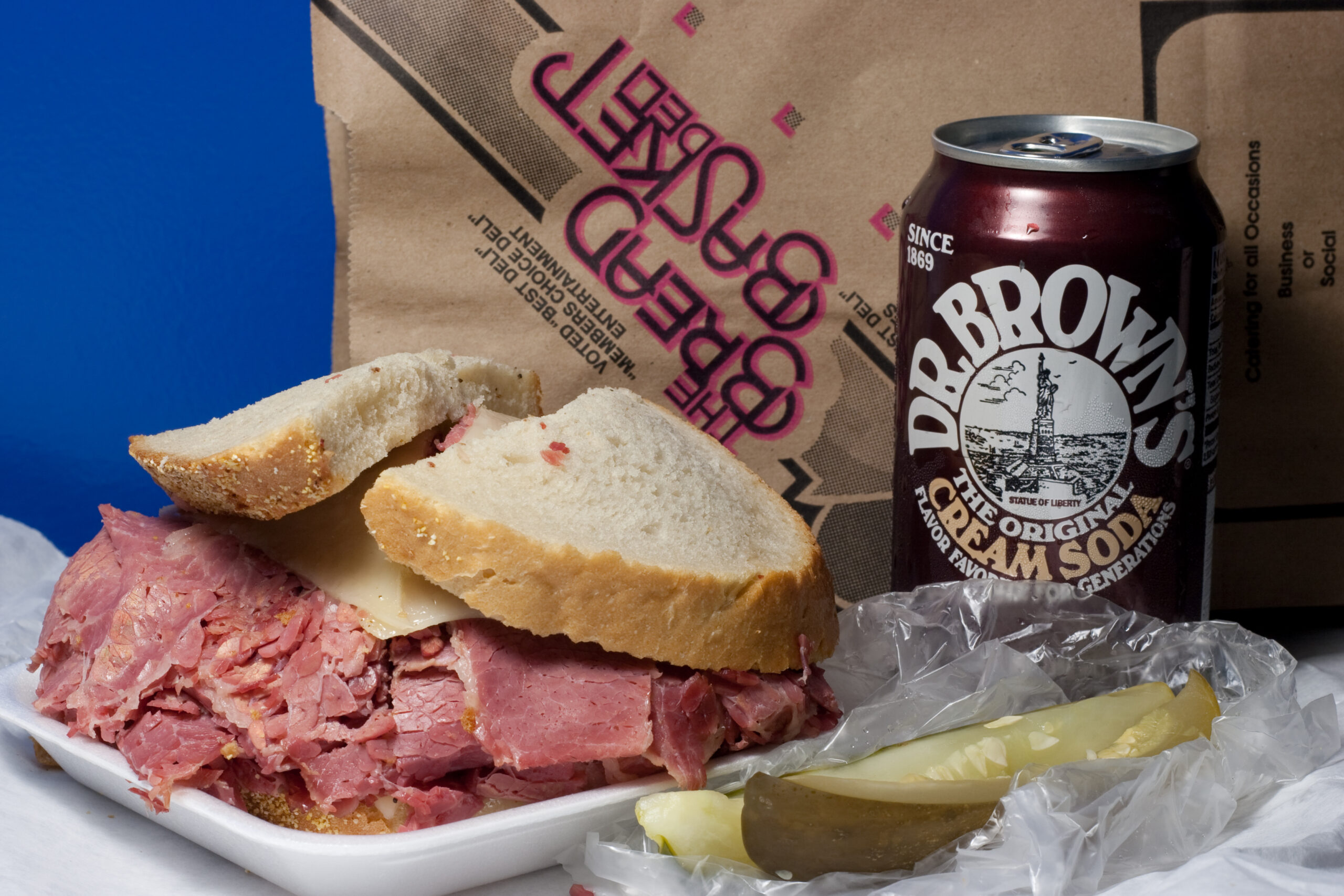 Corned beef and swiss on rye, old and new pickles, and a can of Dr. Brown's Cream Soda from The Bread Basket Deli on 8 Mile. Unfortunately the Dr. Brown's Cream Soda contains HFCS.