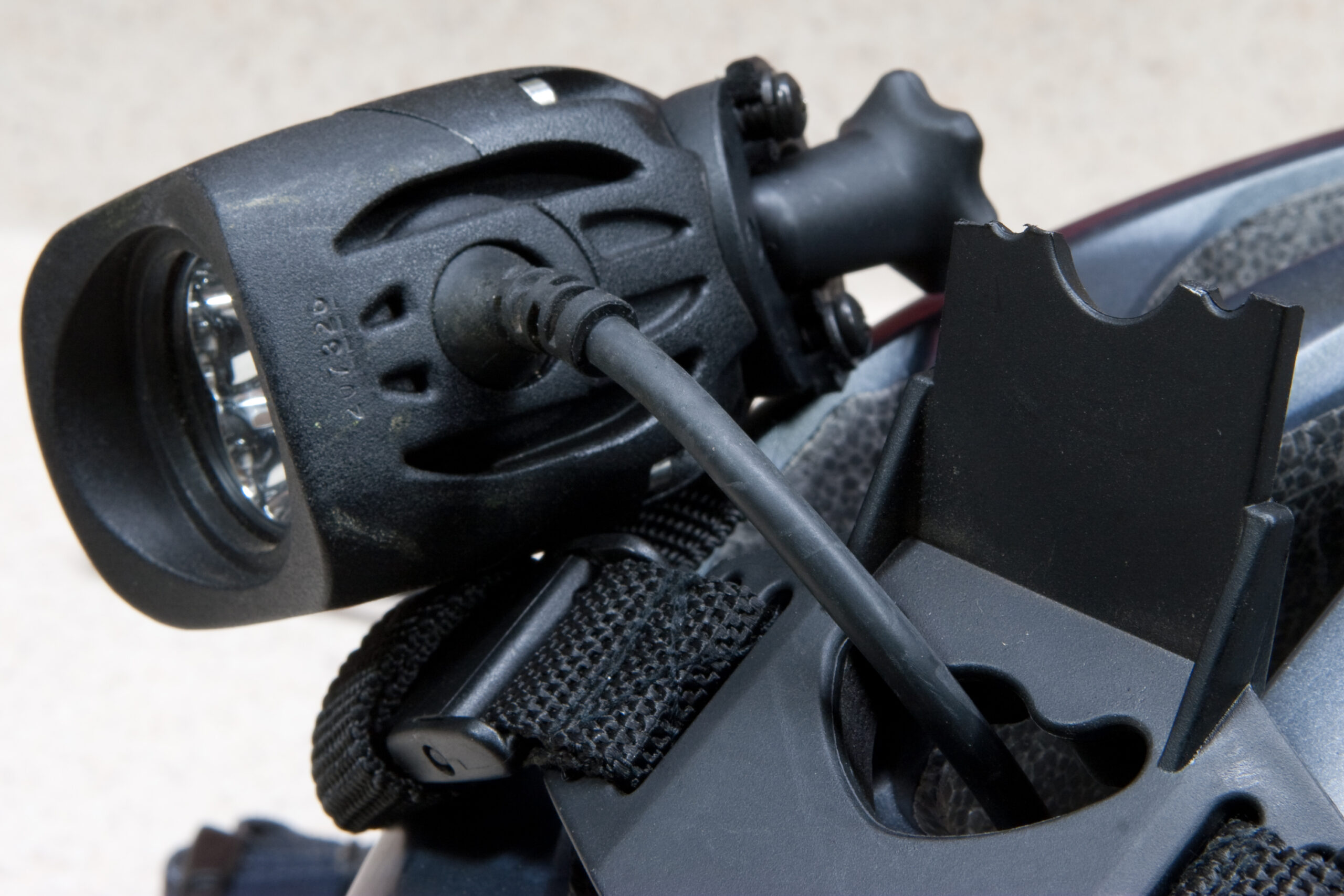 While riding at River Bends my TriNewt hit some low hanging brush and broke the mount. I also suspect that wires inside the cable stretched and broke, as it no longer turns on.