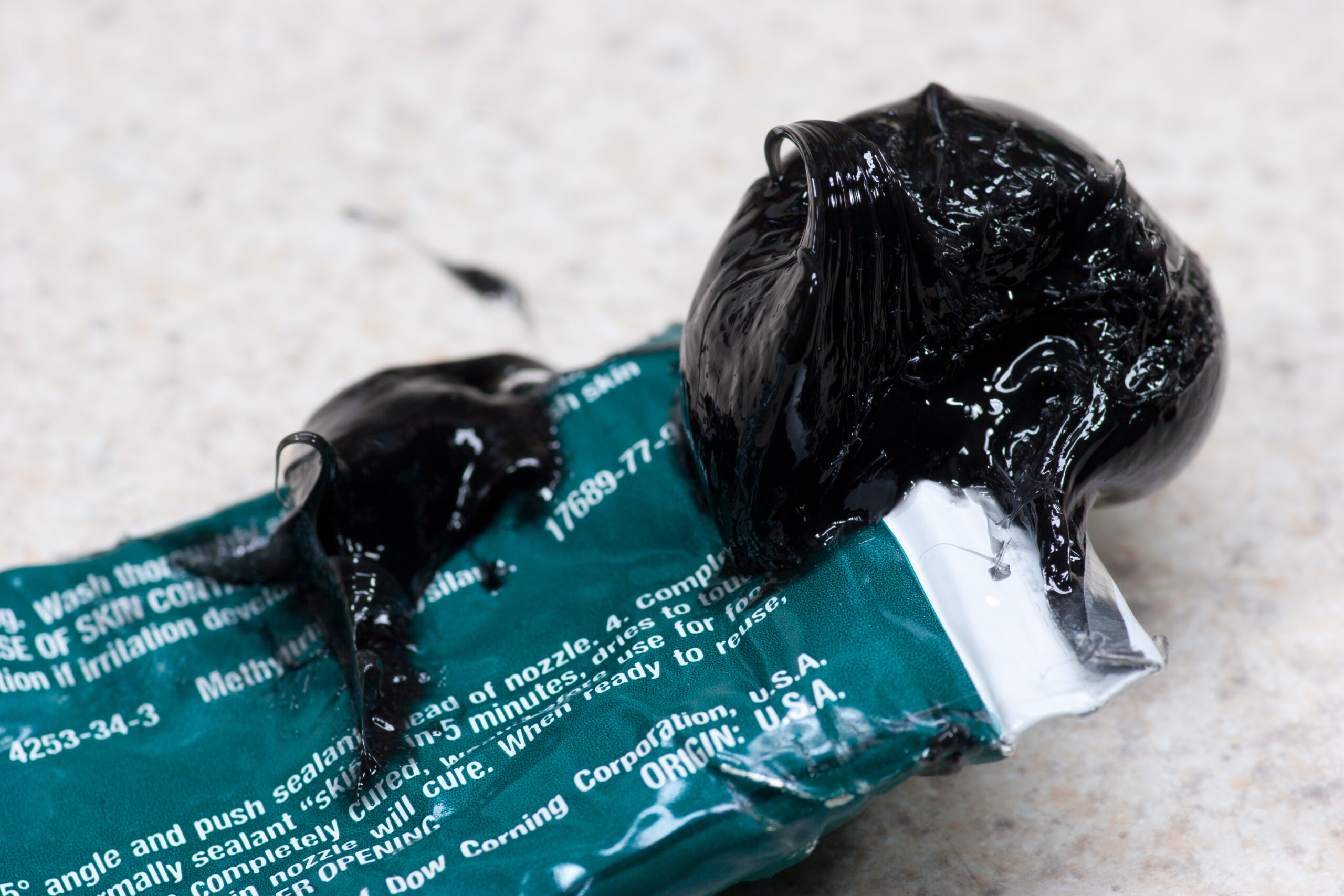 I accidently exploded a tube of Dow Corning 732 black RTV by squeezing it hard from the middle.