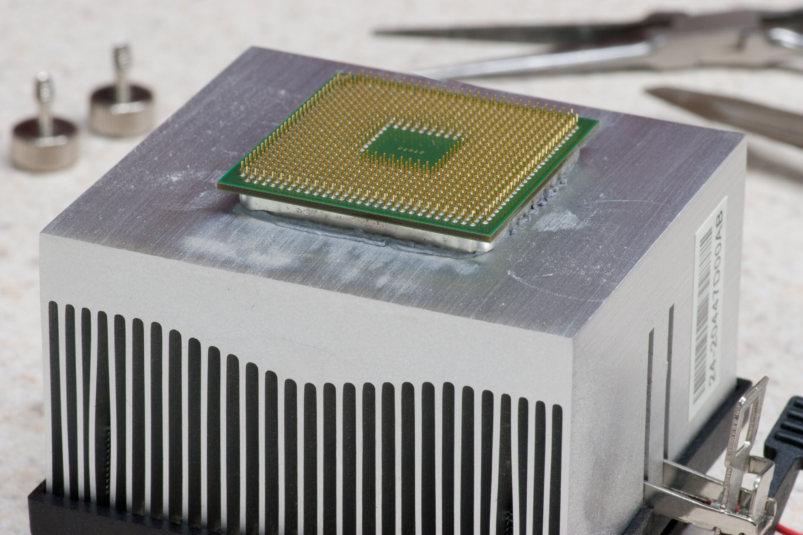 CPU from an eMachine that wasn't seated in the socket and came out when the heatsink was removed.
