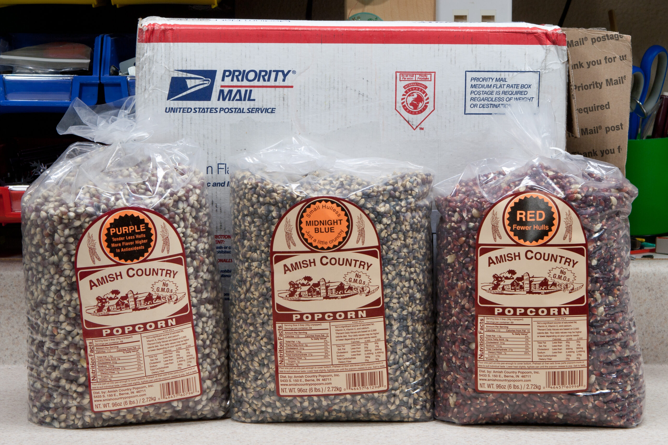18 pounds of popcorn from Amish Country Popcorn packed into a Priority Mail Medium Flat Rate box.