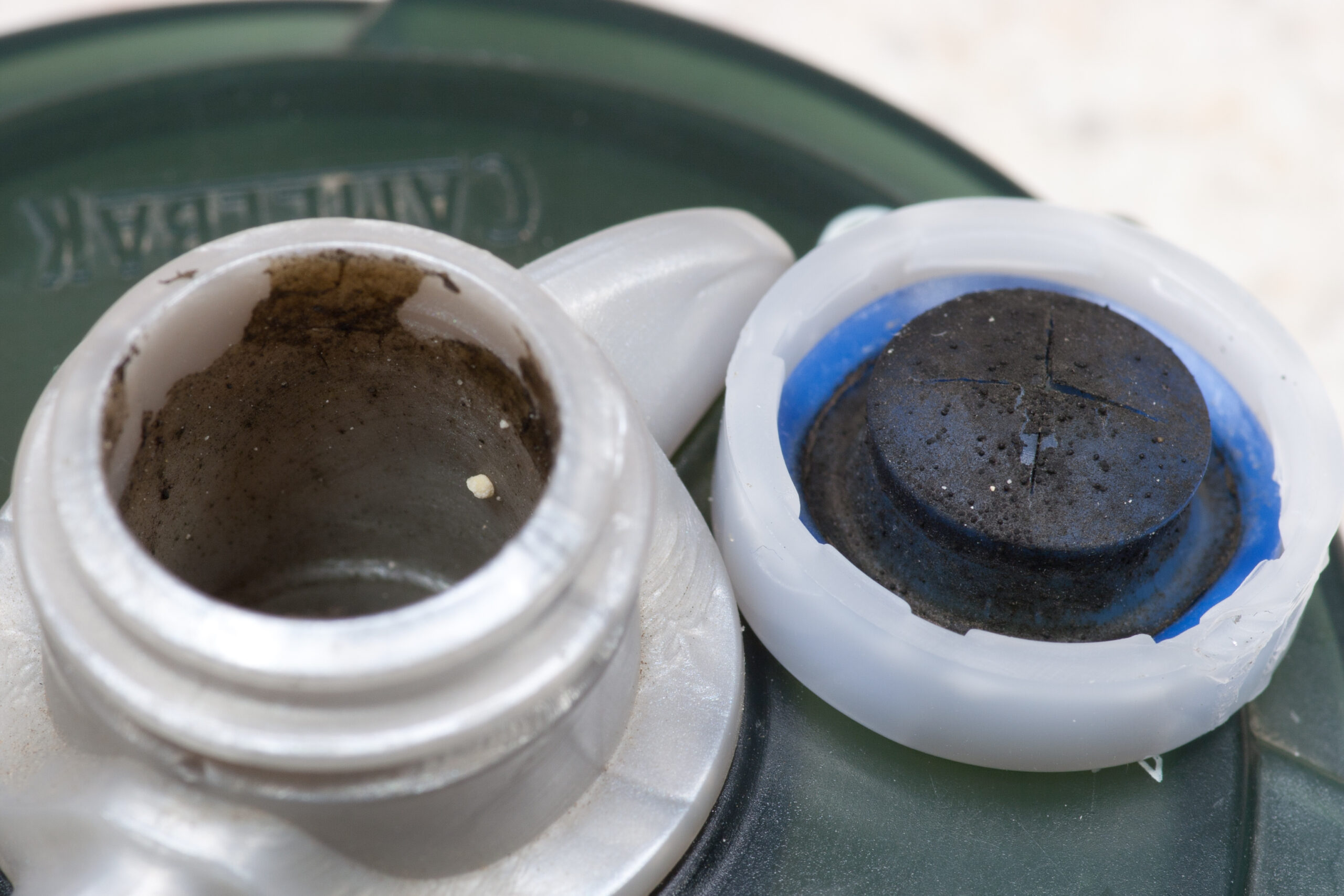 Black residue / mildew on the inside of the burst valve in a CamelBak Bottle.