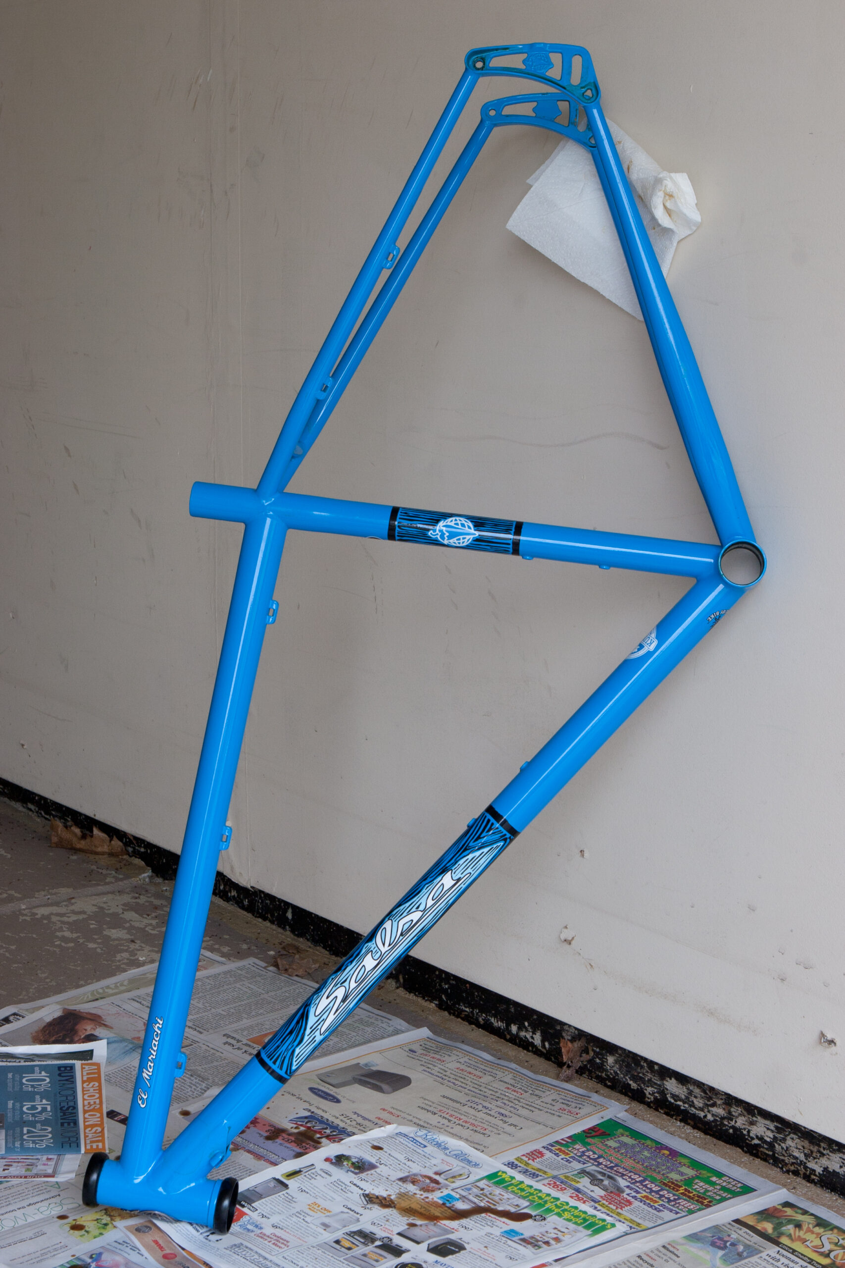 El Mariachi frame, with the Alternator dropouts removed, having been sprayed with Amsoil MPHD for internal corrosion protection, set at an odd angle so to properly coat the tubes.