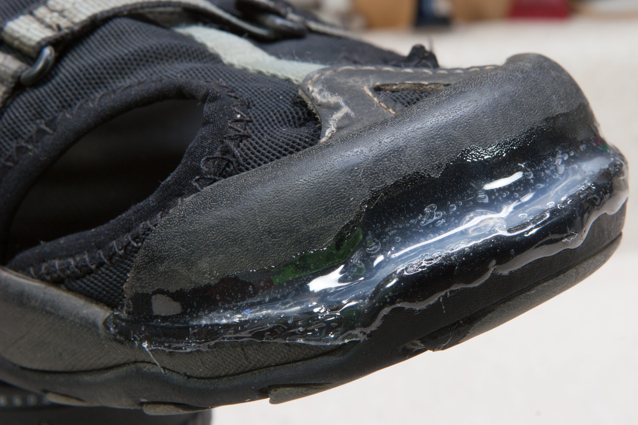 Left toe of my Ahnu sandals after repair with Shoe GOO. It had peeled back and wouldn't stay glued properly, so I filled the resulting gap.