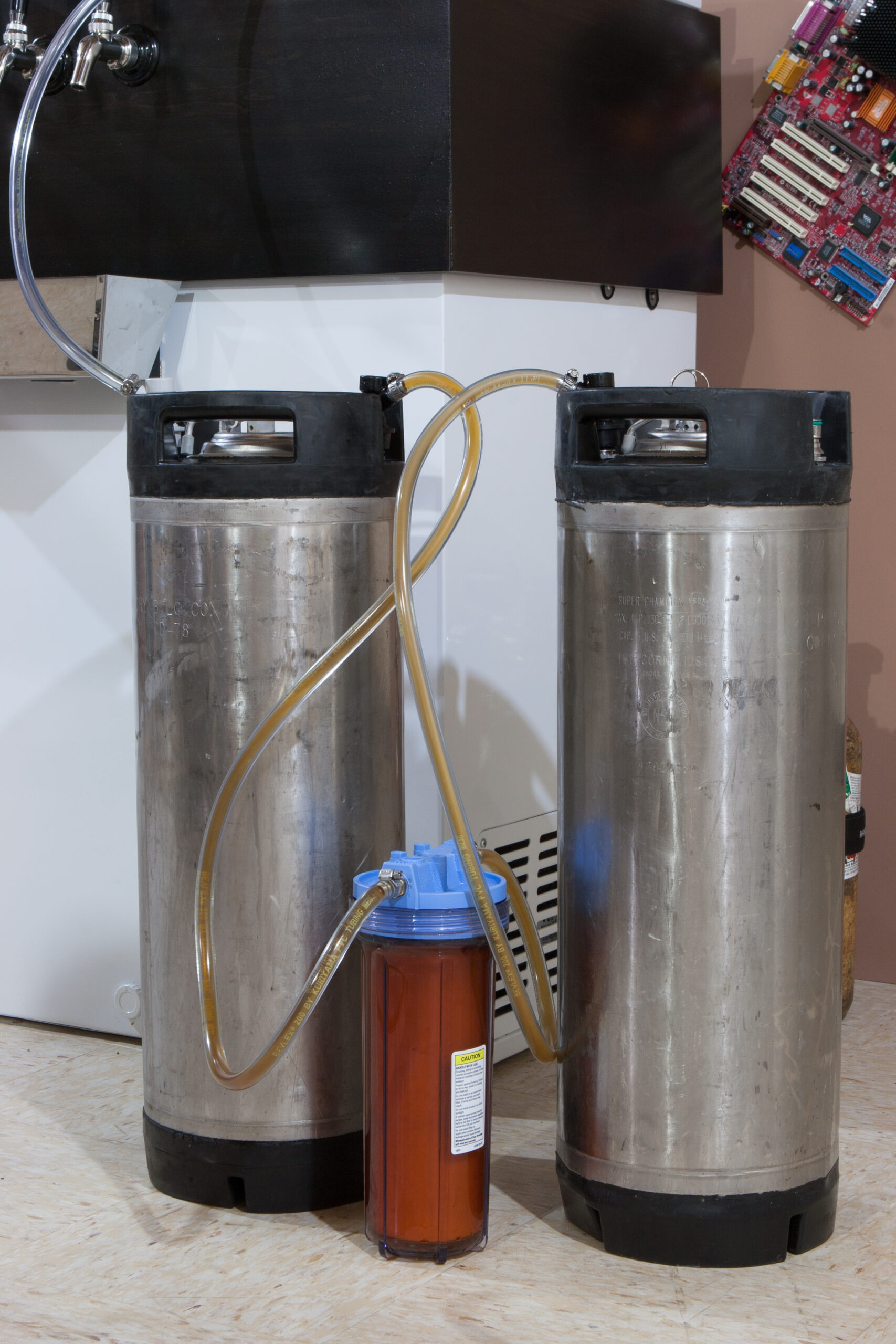 Mostly-carbonated rye pale ale being filtered.