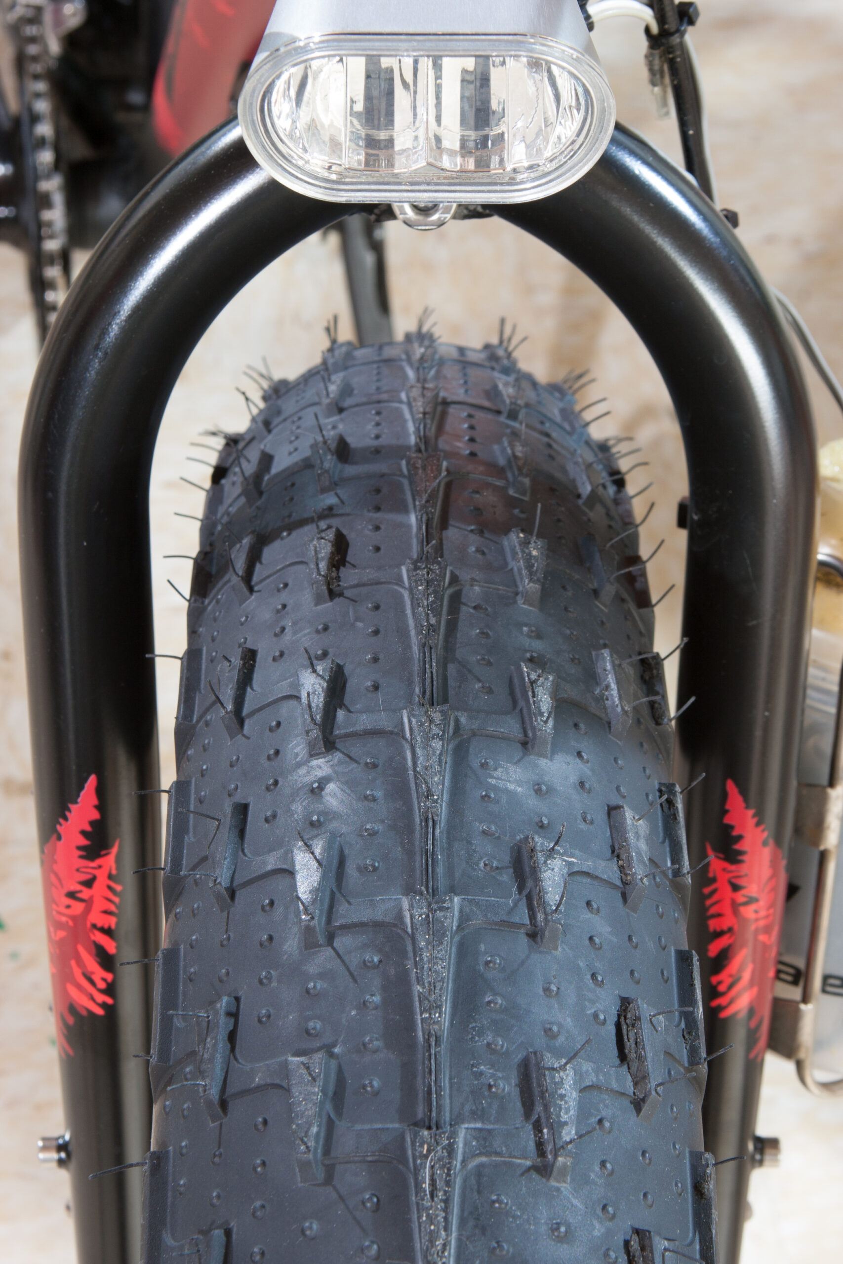 Surly Big Fat Larry on a Rolling Darryl rim at 30psi in a Salsa Enabler fork. There is plenty of room to spare.