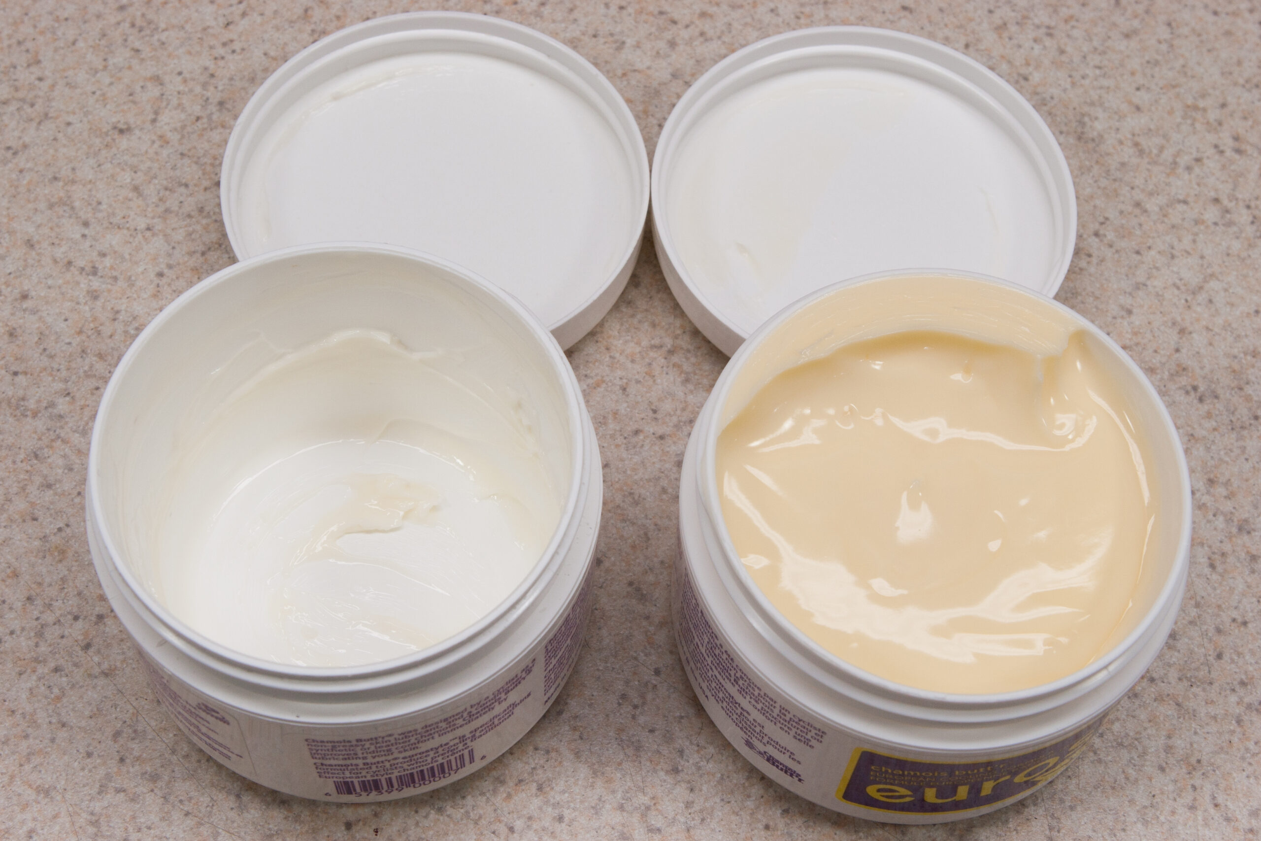 The new container (right) of Chamois Butt'r Eurostyle is darker in color than the old (left). I wonder if it'll be different...