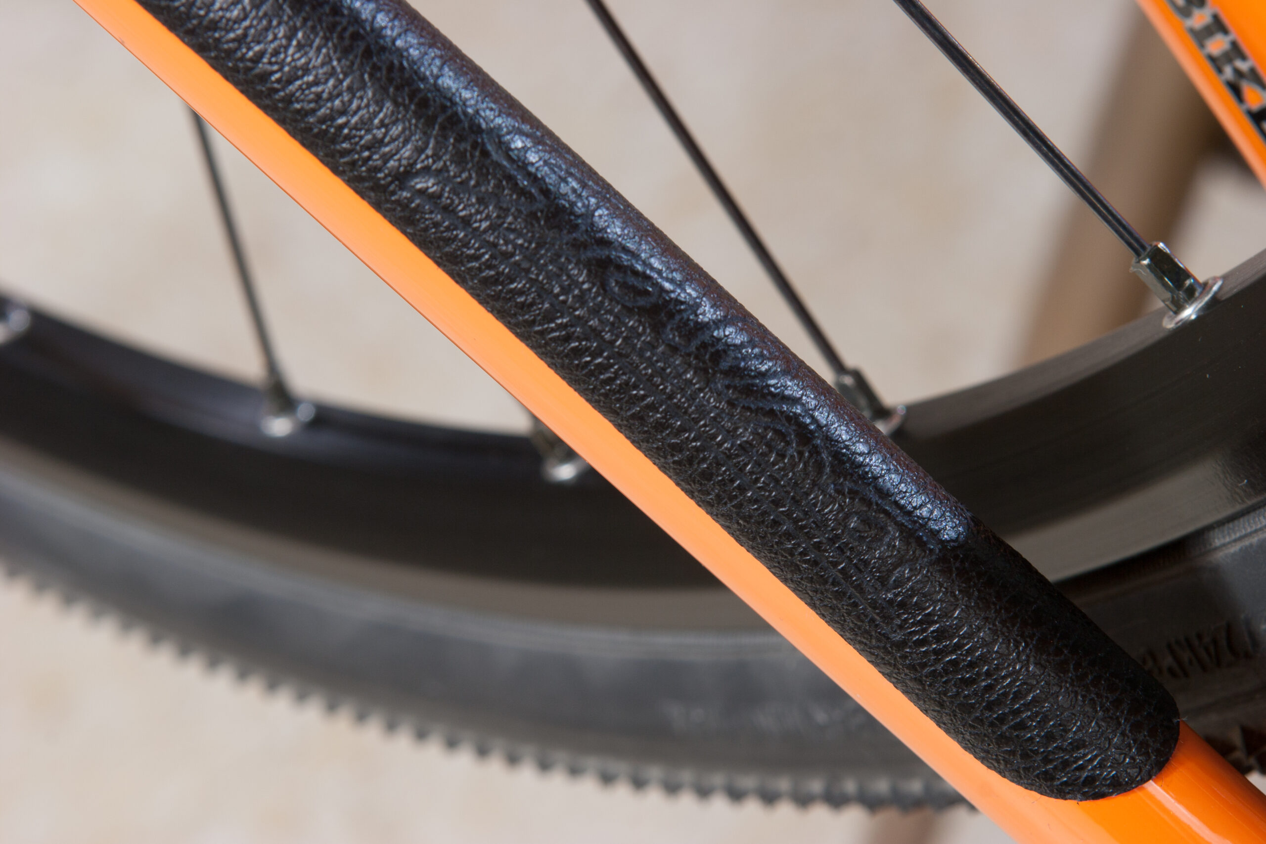 After reactivating and cleaning the adhesive with isopropyl alcohol then polishing it the chainstay protector looks great.
