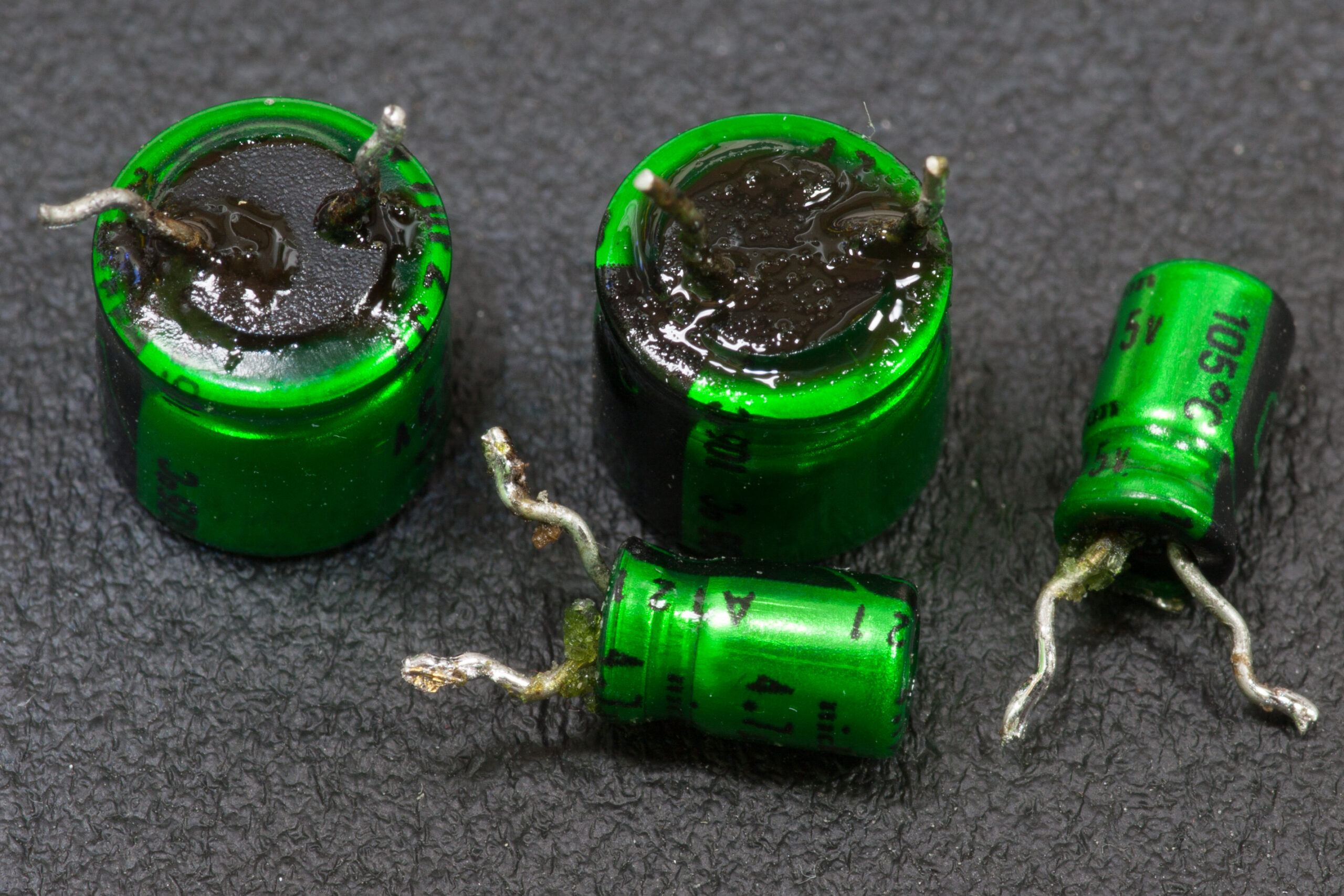 Failed Nichicon electrolytic capacitors removed from the Maytag stove/oven in the kitchen.