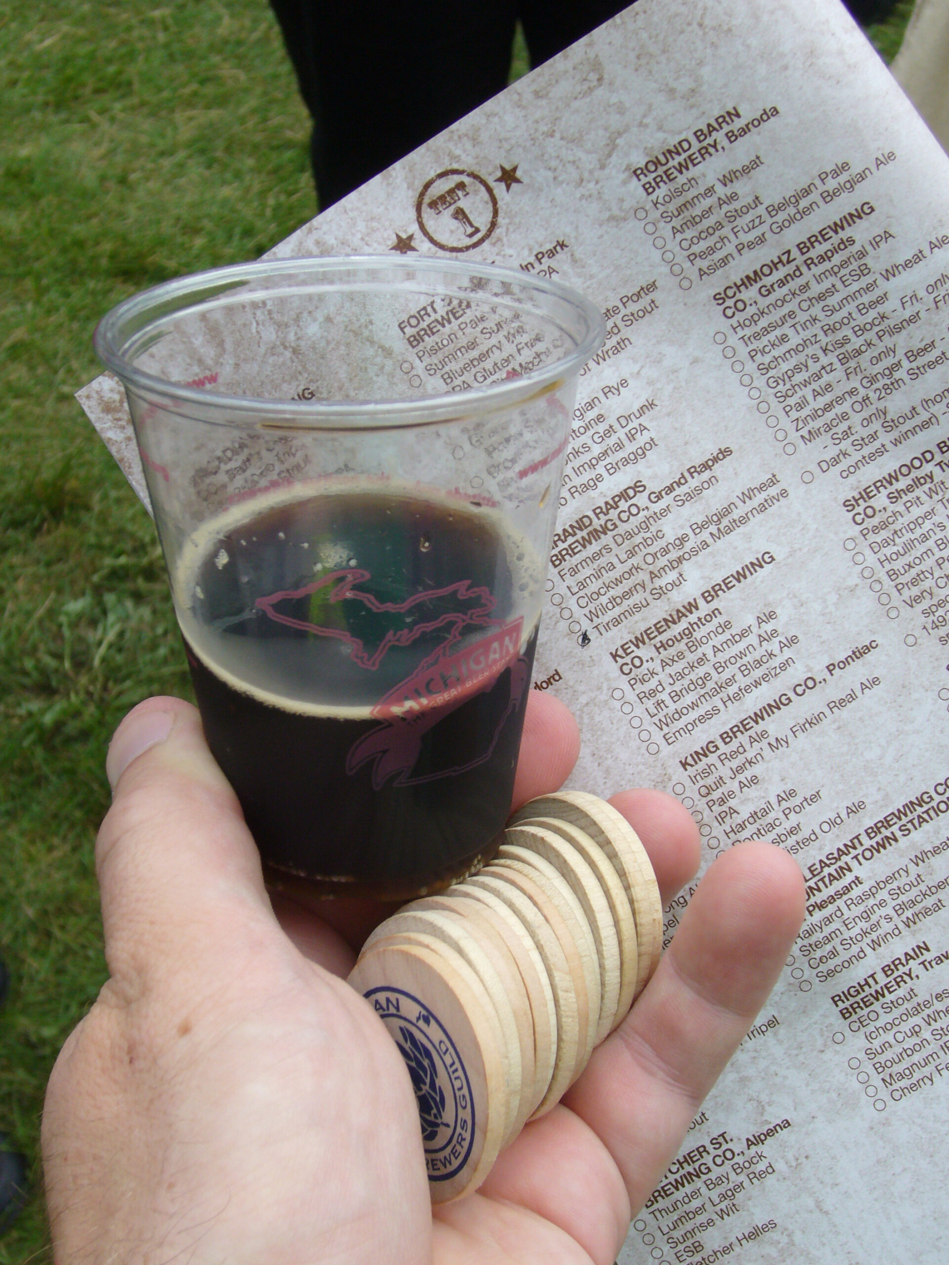 My glass of Tiramisu Stout and a handful of tokens.