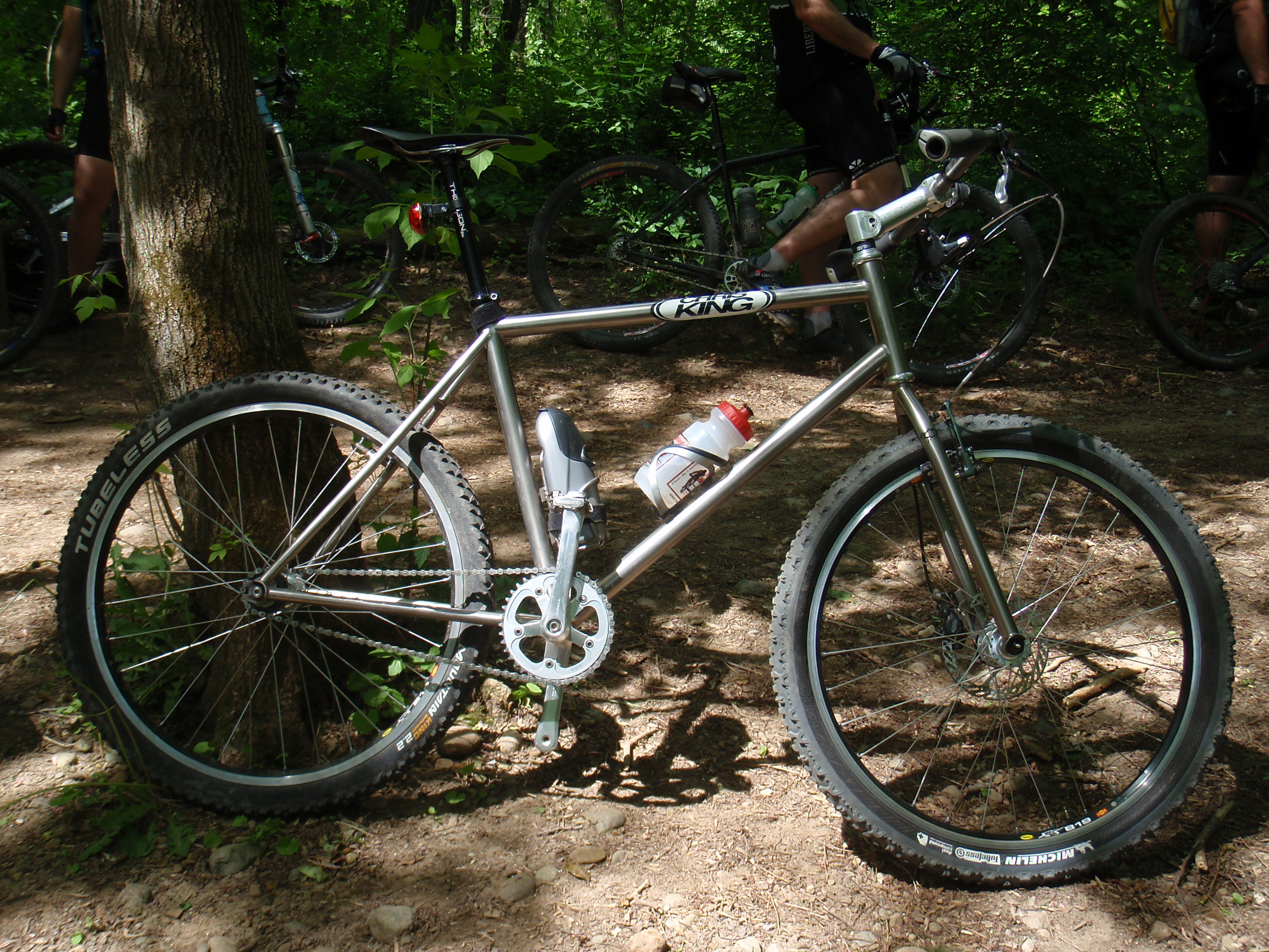 Fixed gear, fully rigid mountain bike with dual front brakes, (in case one hand gets tired), at the Potawatomi Trail in Pinckney, MI.