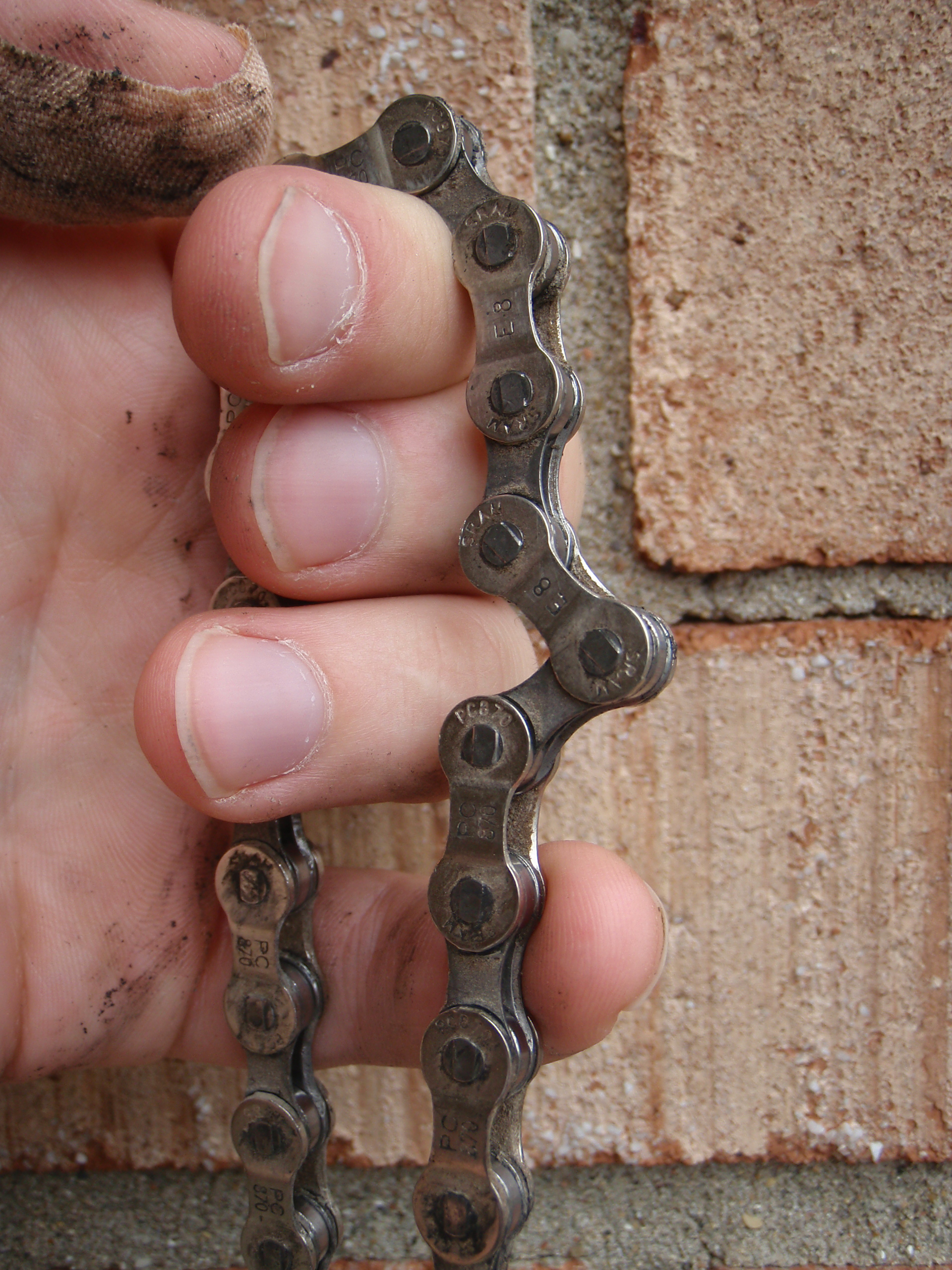 Stuck link on a 8-speed SRAM chain. This chain is quite new, but I think I tried to get too much life out of the factory lube, although the rest of the links still feel (and sound) fine.