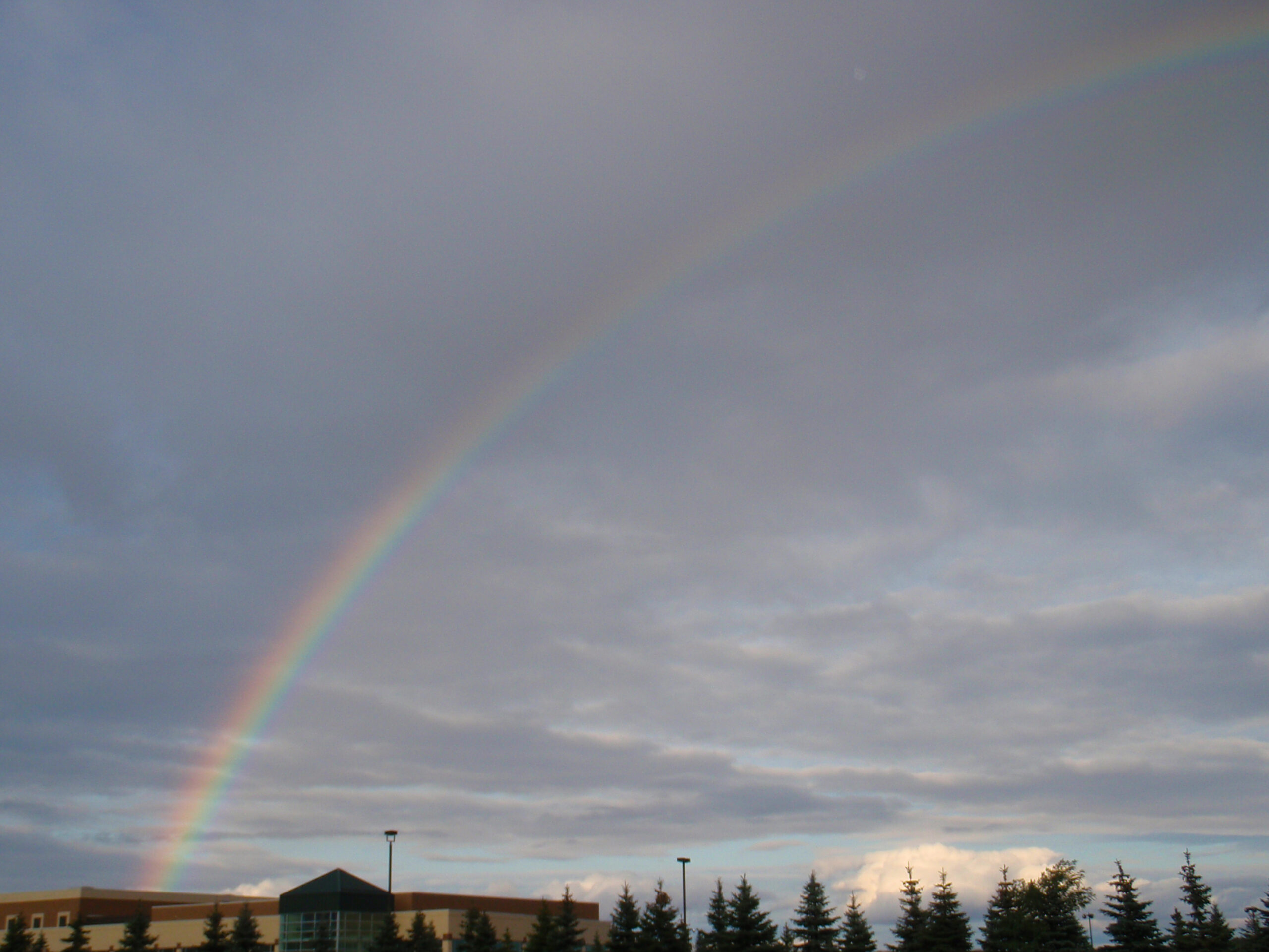 A rainbow above Stony Creek High School before a wednesday night MMBA group ride.